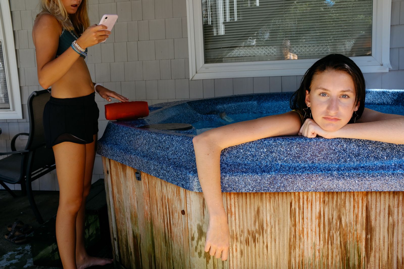 © Angela Ramsey - Anne enjoys the hot tube by herself. This is rare moment in a large family.