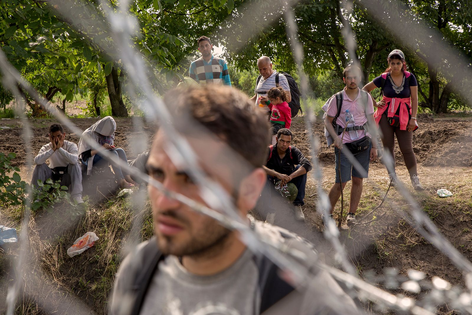 © Alessio Paduano - Migrants are seen near the Serbian border with Hungary in Rozske, Hungary on September 15, 2015.