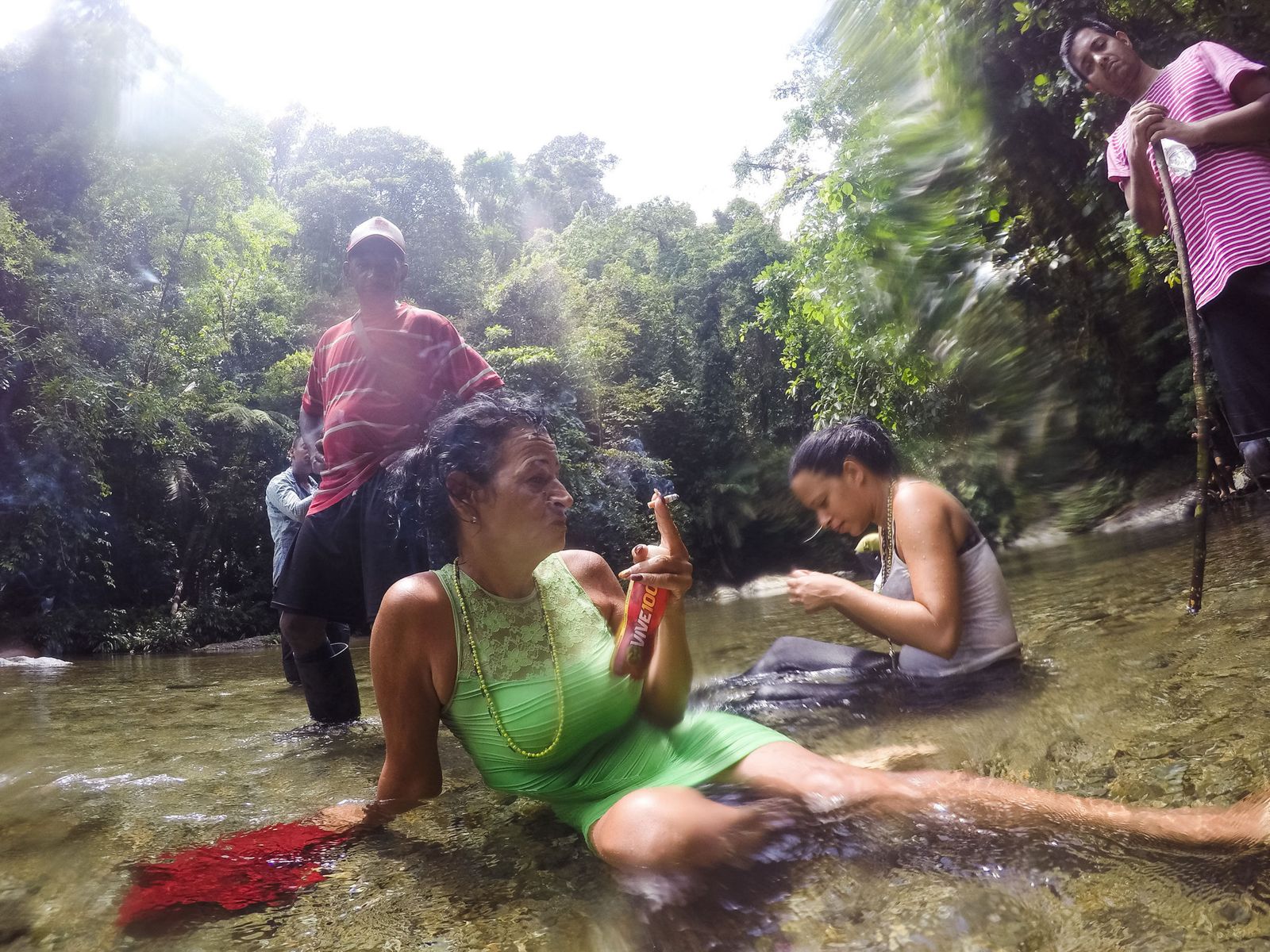© Lisette Poole González - In the Darien Gap, the women stop after one of many river crossings.