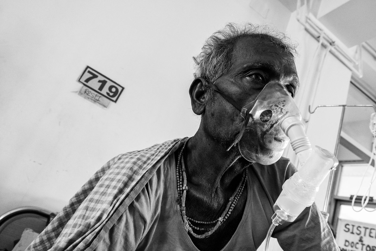 © Marco Sacco - A patient in the Respiratory Department of the Tribhuvan University Teaching Hospital during aerosol therapy.