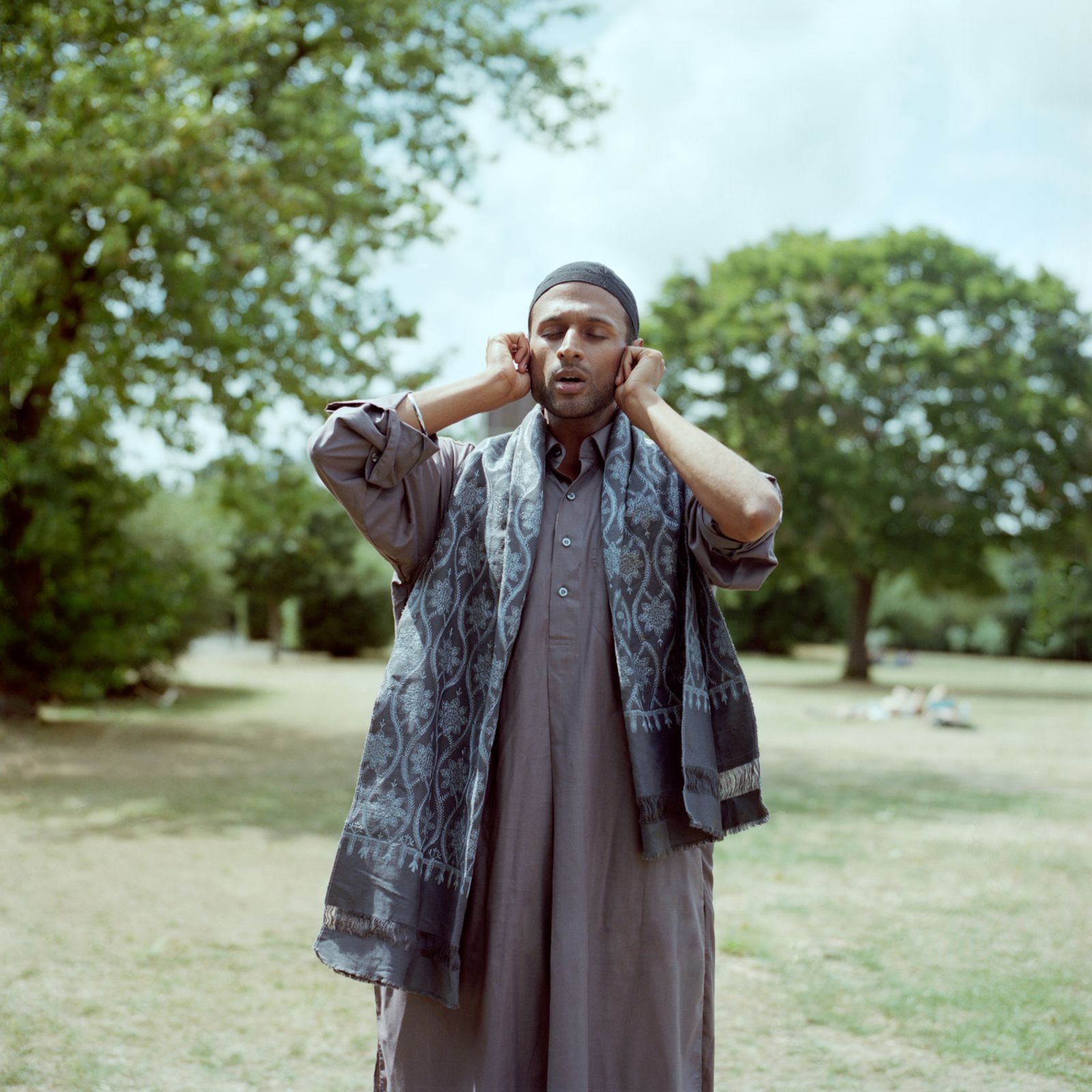 © Lia  Darjes - Calling for an inclusive eid-prayer in a public park in London.