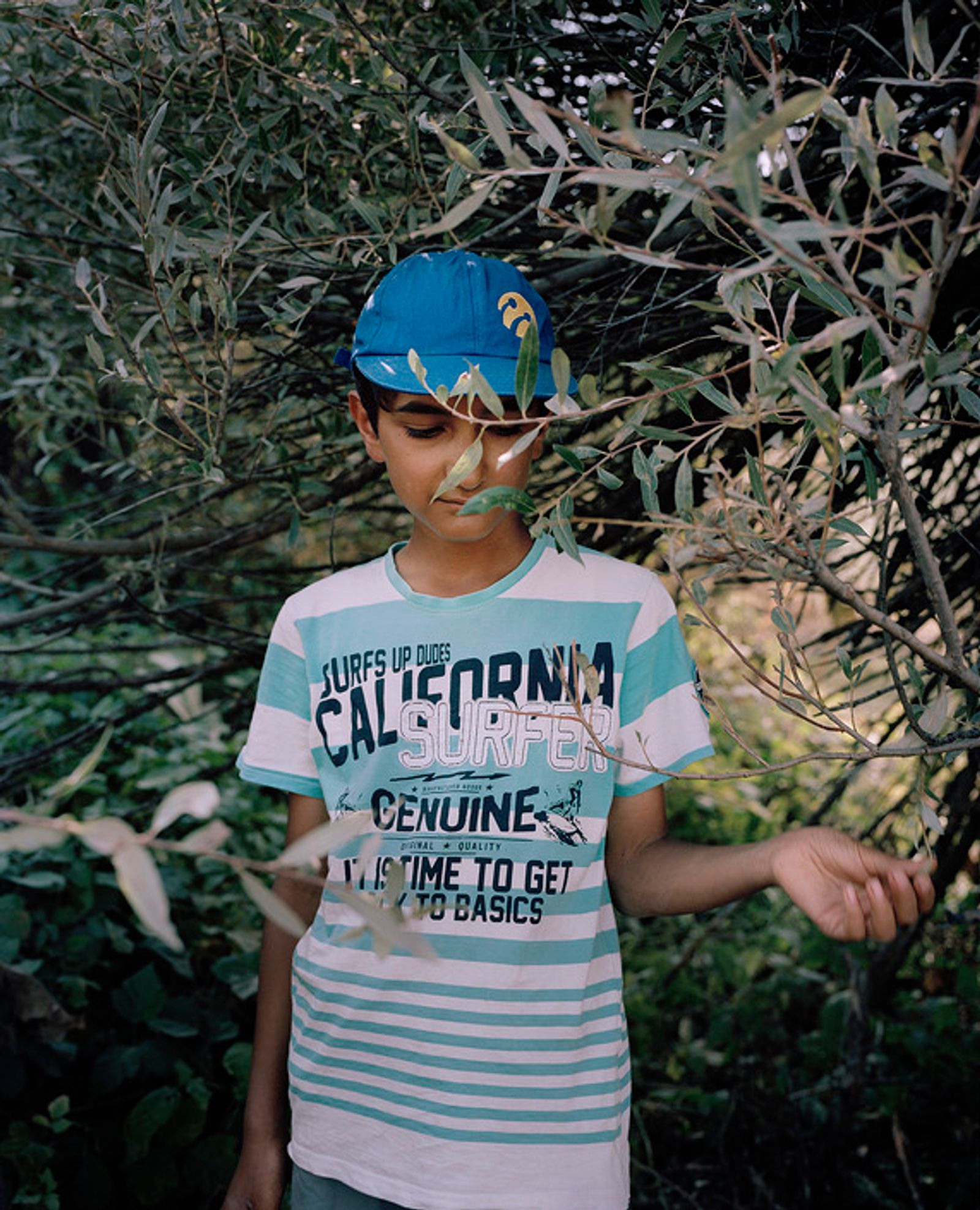 © Miriam Stanke - Little boy taking a rest while supporting his family by taking care of the cows and sheeps