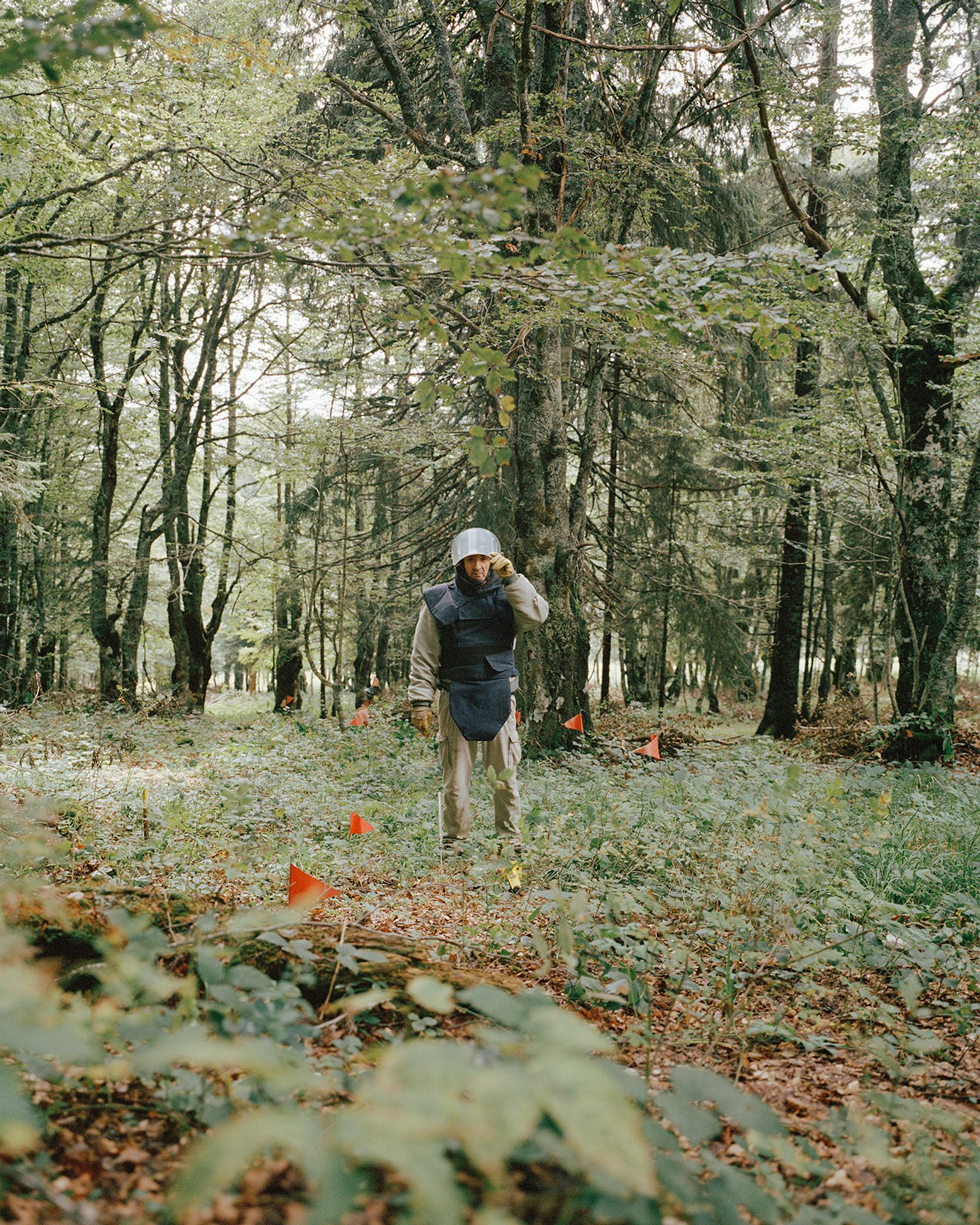 © Miriam Stanke - A deminer at work marking the ground for detecting mines in Glamoc