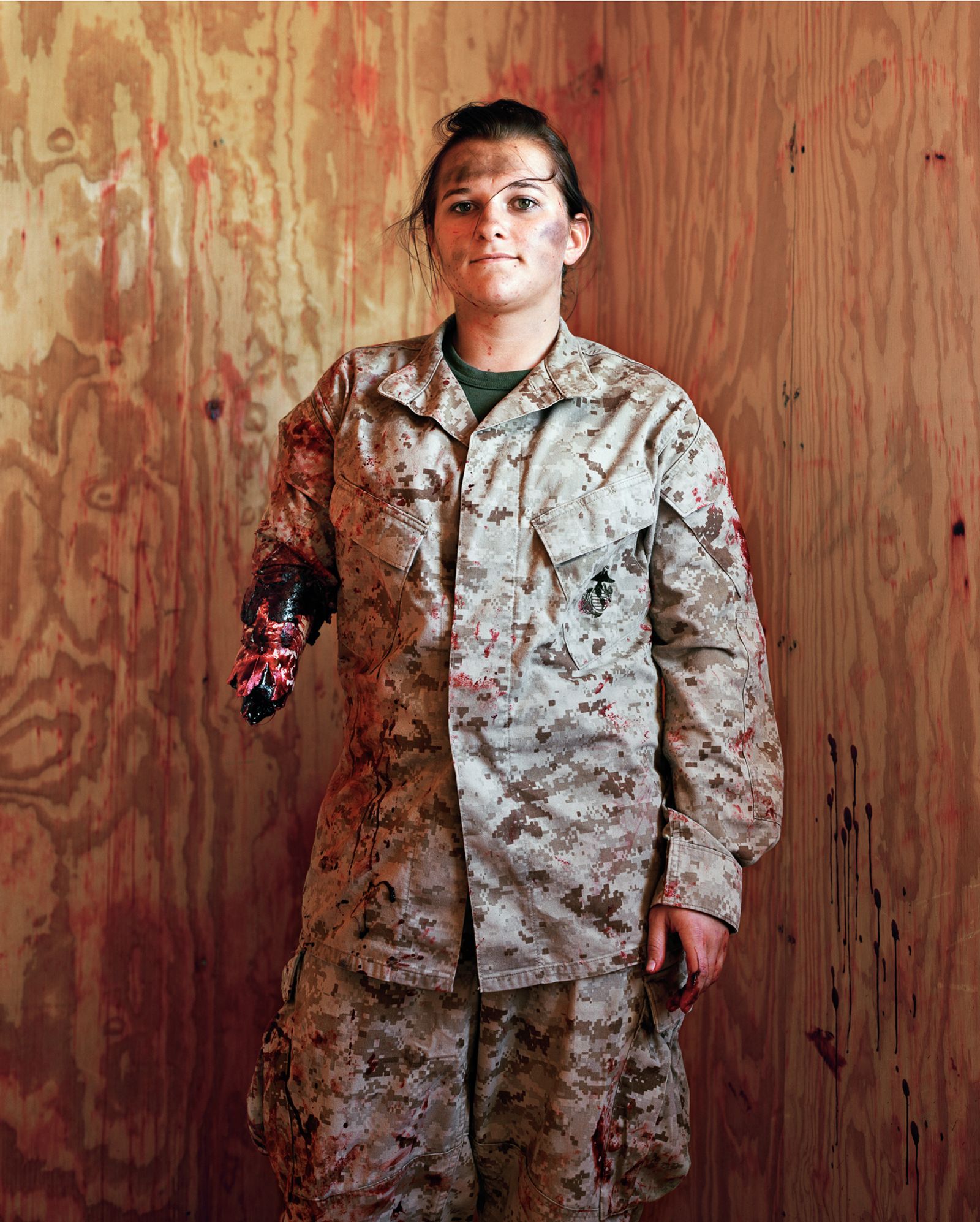 © Claire Beckett - Civilian Krista Galyean playing the role of an American Marine injured in an IED blast