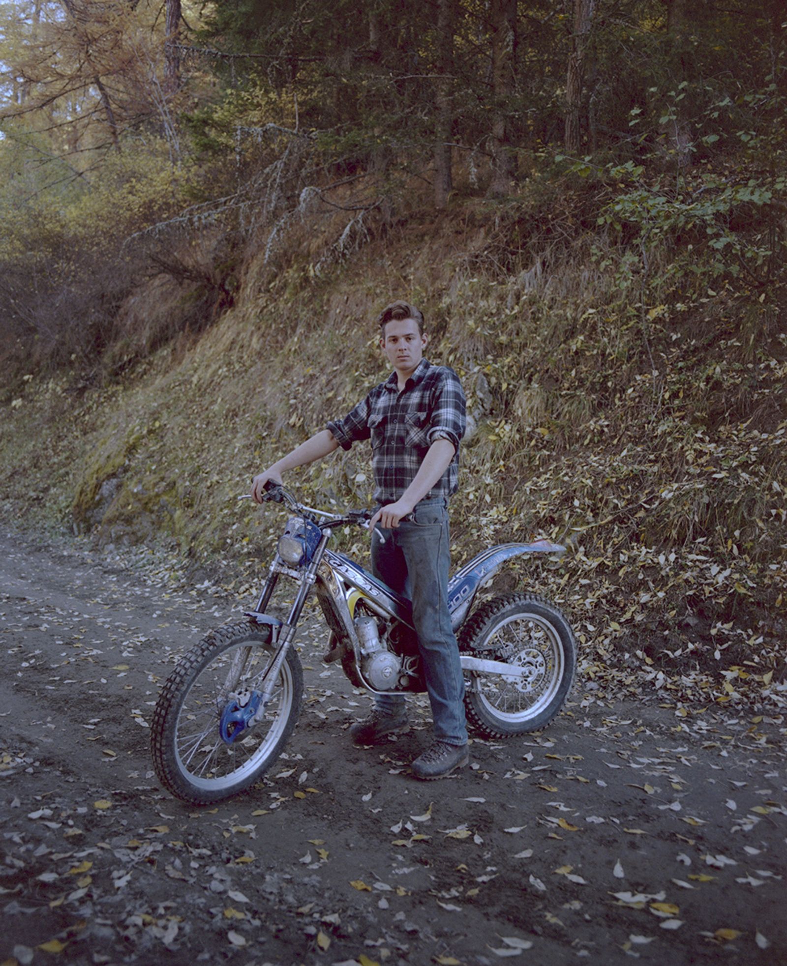 © Nola Minolfi - Claudio, 17 years old.He loves to do trial with his motorbike among the woods.