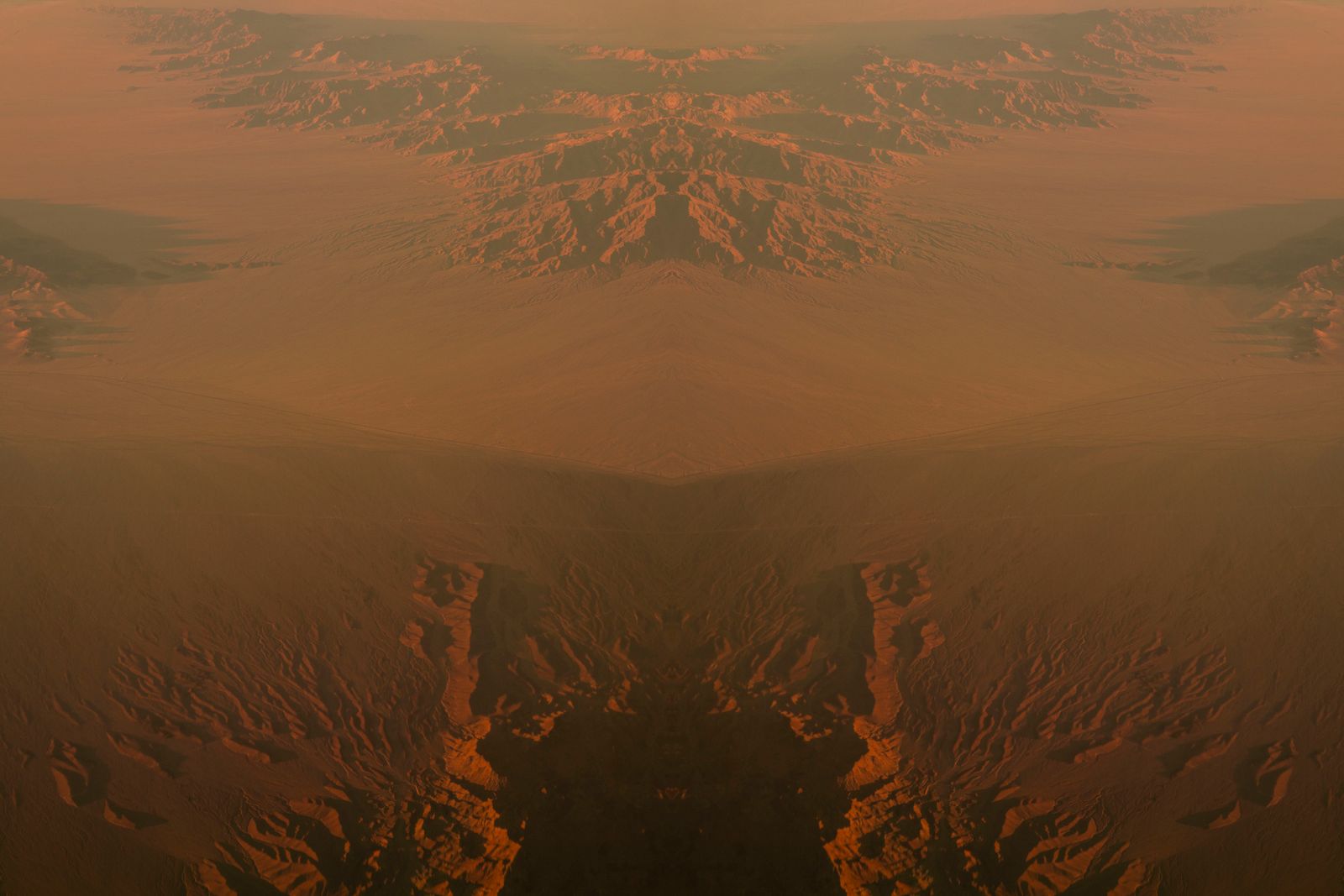 © Mackenzie Calle - Mirrored aerial landscape.