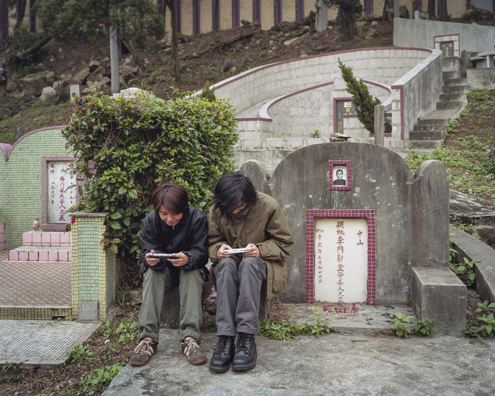 © Adam Lampton - Teenagers on their Grandmother's Grave, Macao (Img#: 19) (Size: 28x30") Archival Inkjet Print (2007/18)
