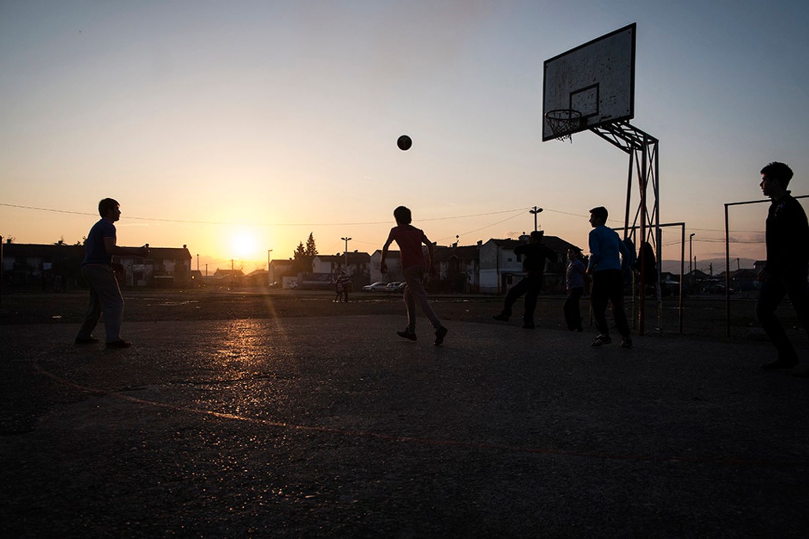 © Gianmarco Maraviglia - Camp Konic, Podgorica, Montenegro. Children playing basketball in the camp.