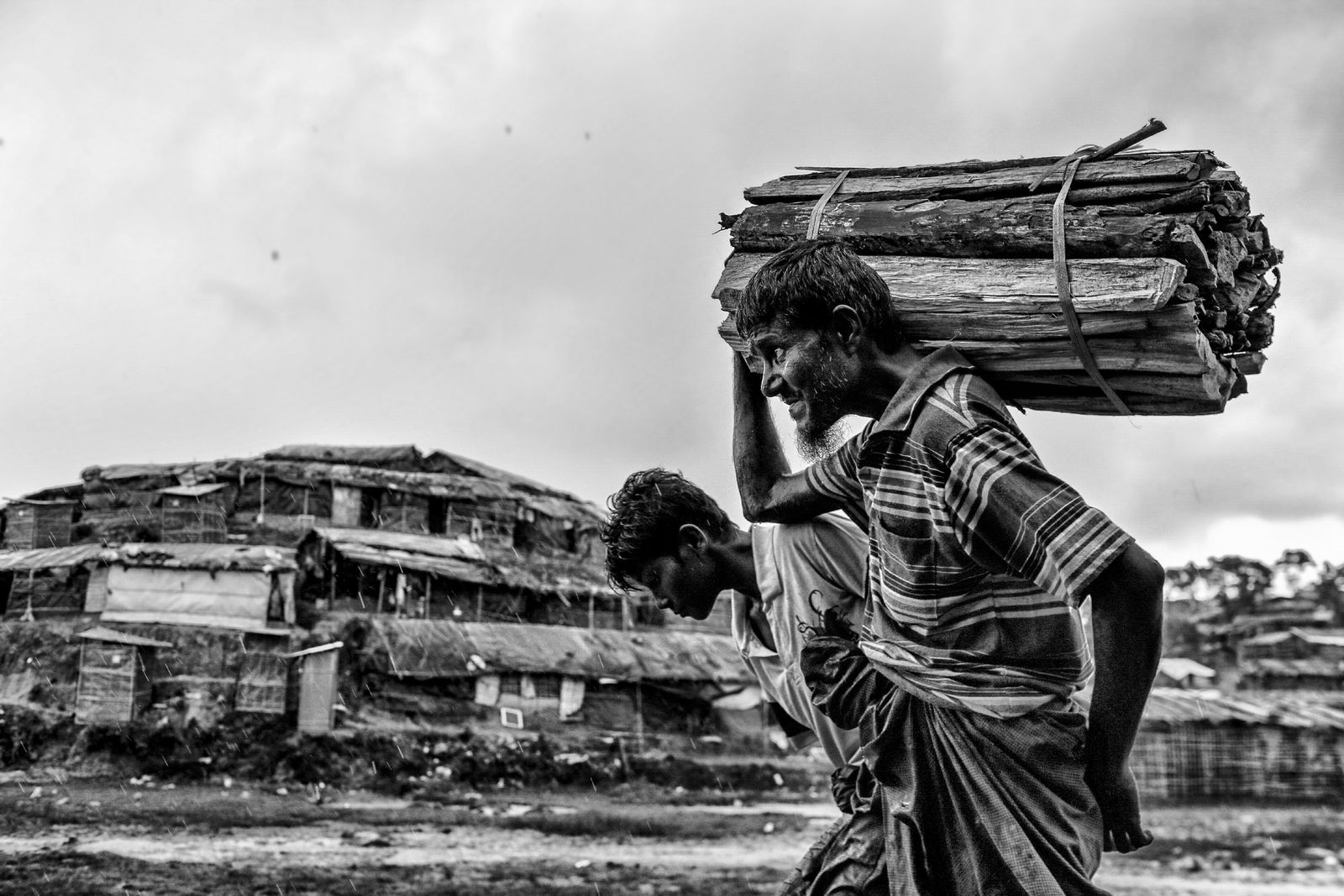 © Mohammad Rakibul Hasan - Rohingya Refugee bringing woodstock to use them as for fuel to his camp.