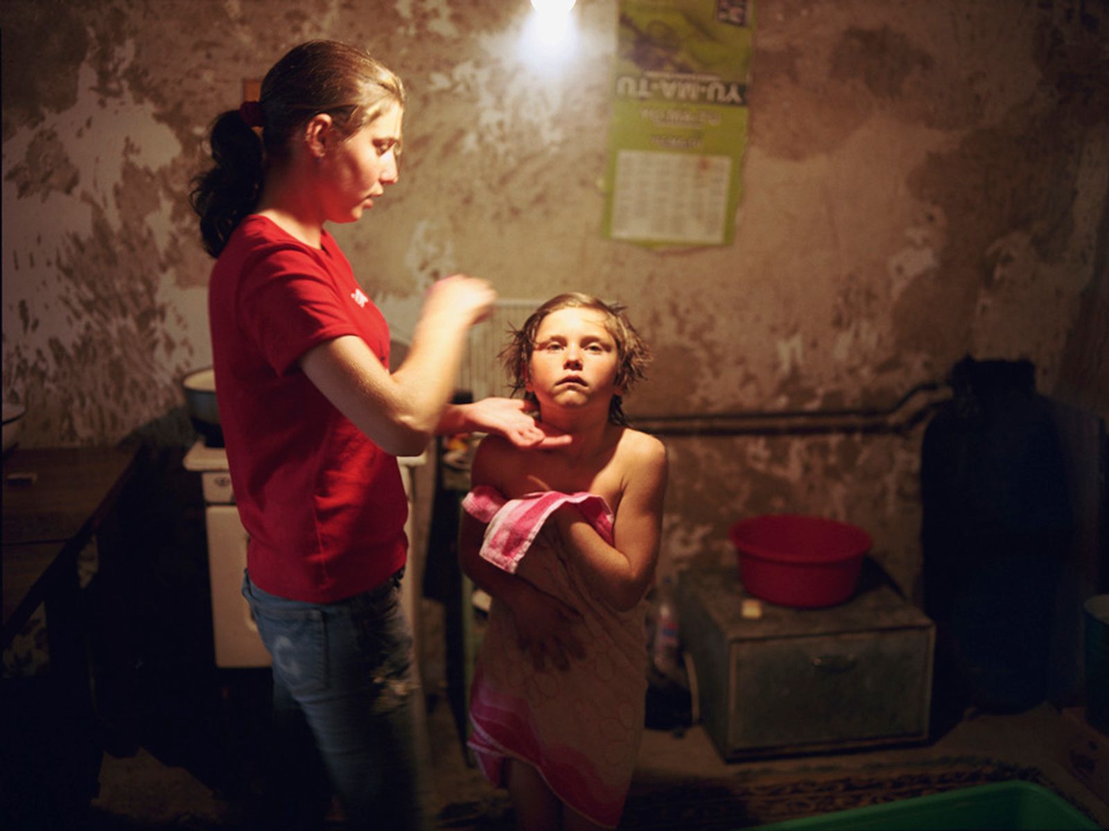 © Andrea Diefenbach - Marina is taking care of her sister Gabi. Their mother lives and works in Italy, the father often works in Russia.