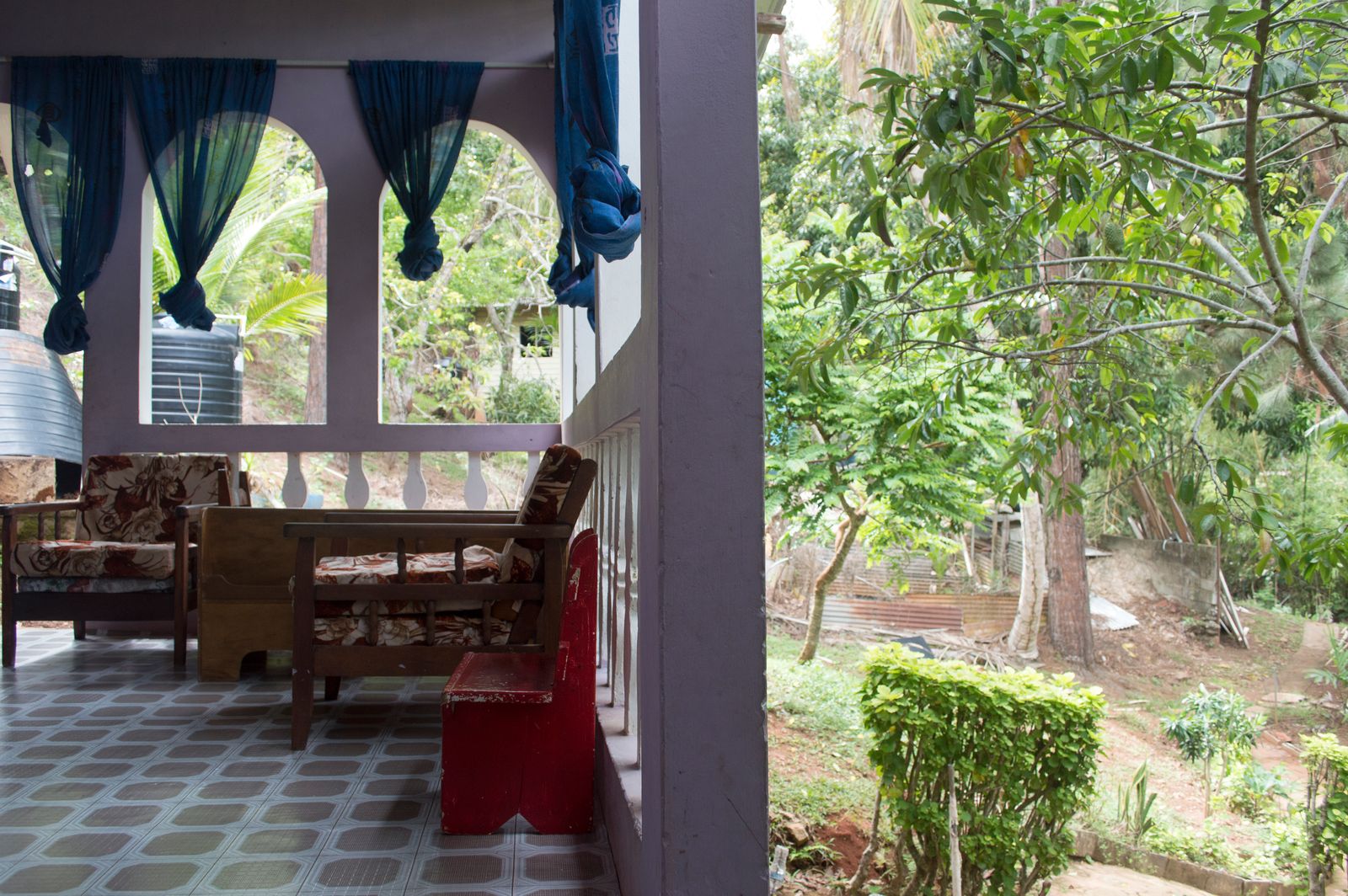© Johanne Rahaman - A view of the porch and garden at home of brother Courtenay Rahaman. Diego Martin, Trinidad 2016