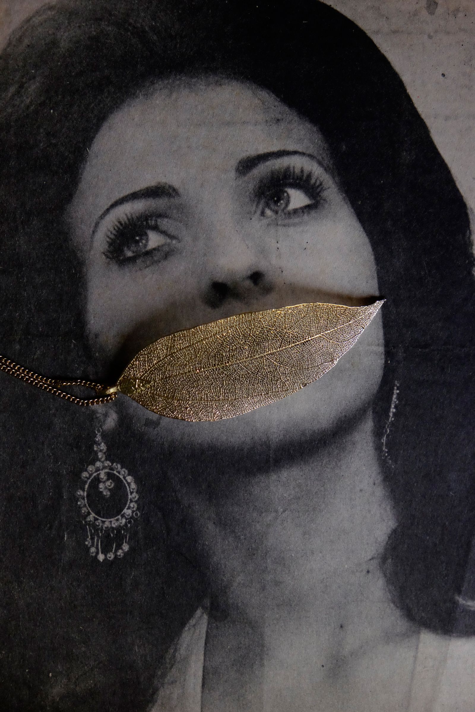 © Santiago Escobar-Jaramillo - Golden-leaf jewel covering an archive photo portrait. 2016.