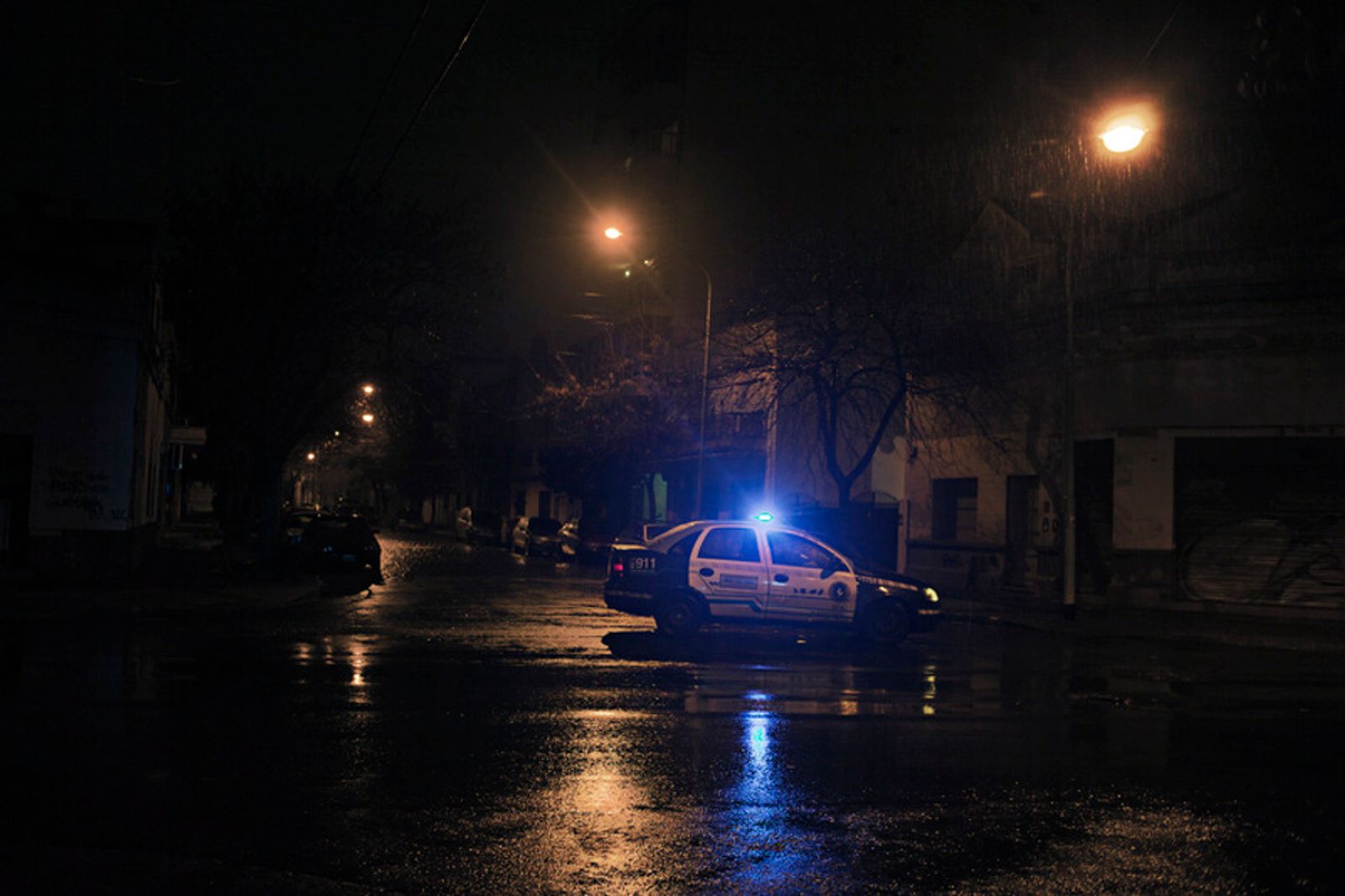 © Myriam Meloni - A police car during a night patrol.
