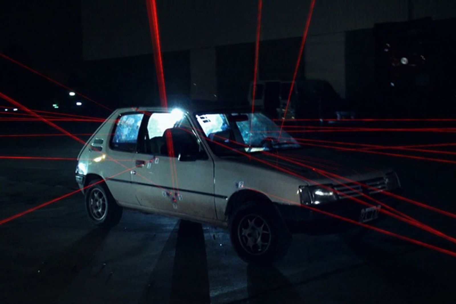 © Myriam Meloni - The car of Fernando Carrera drilled by 18 gunshots. Frame from the documentary The Rati Horror Show,