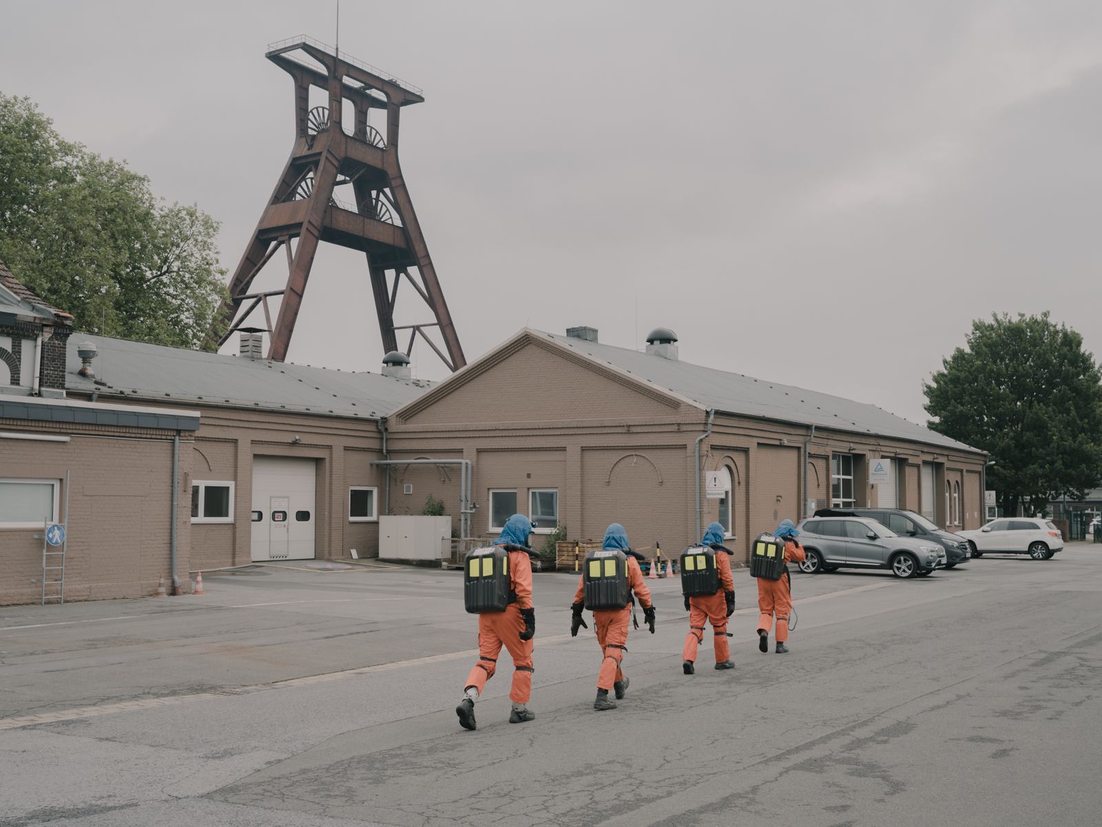 © Arne Piepke - Four mine rescue members after their training at the old Pluto colliery site in Wanne-Eickel.