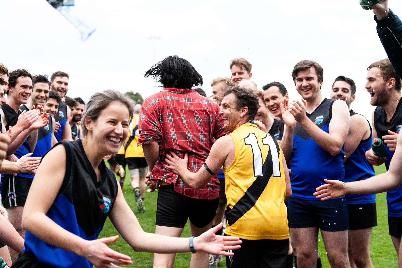 © J Forsyth - Players welcome the next team on to the ground