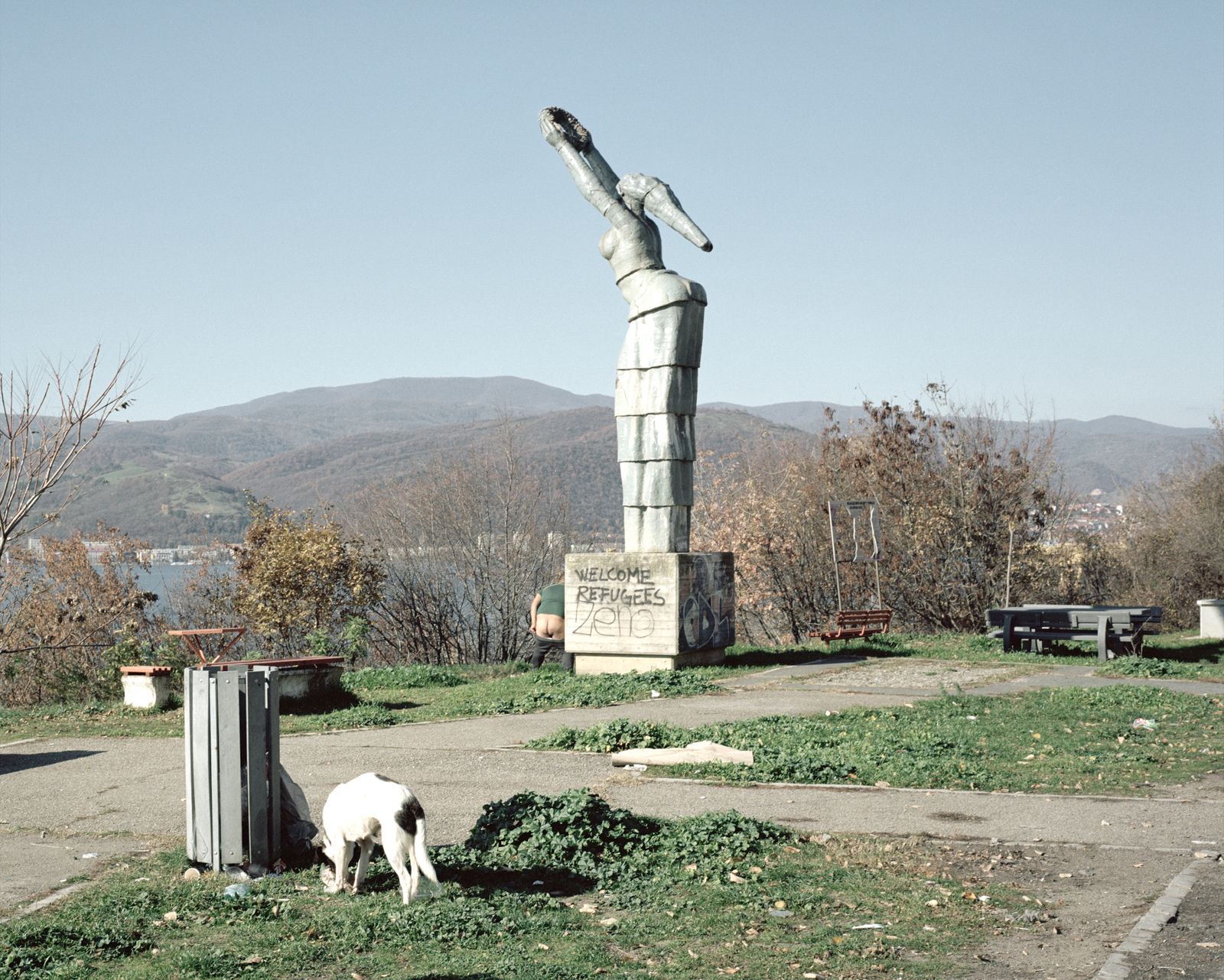 © Tommaso Rada - Romania, Orsova. February 2016. A communist style monument with a wrote welcoming refugees.