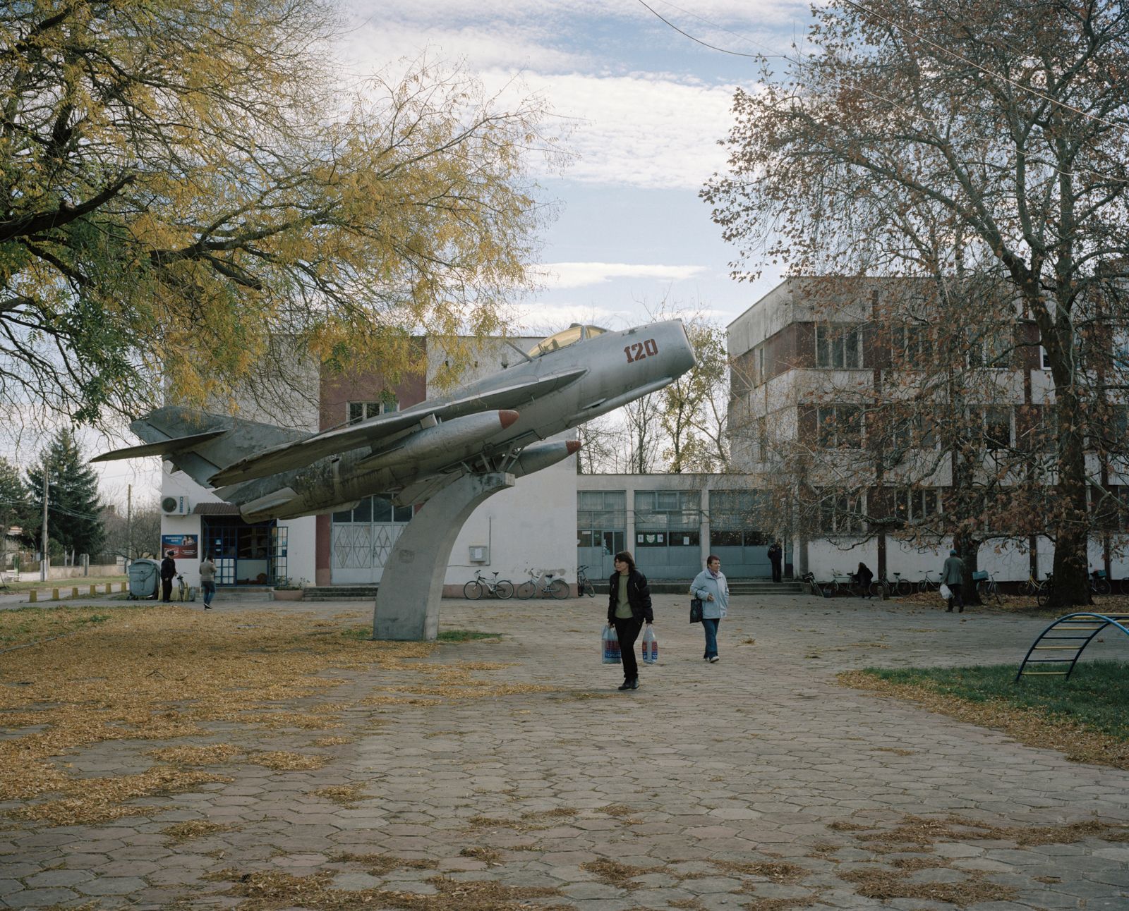 © Tommaso Rada - Bulgaria, Bardaski Geran. A MIG plane uses as a monument in the main square of a village