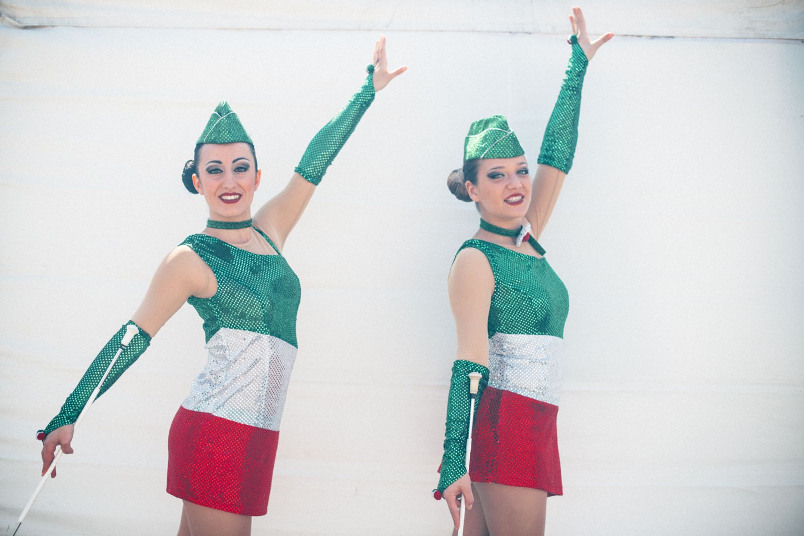 © Agnese Morganti - Viareggio, 2017. Two majorettes pose in their matching Italian flag outfits before performing.