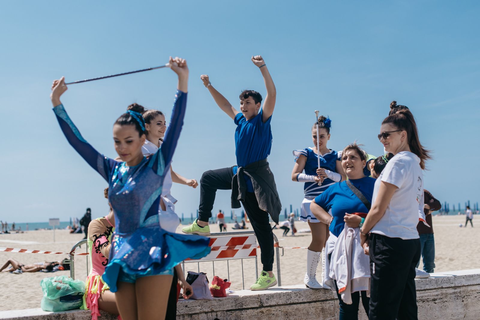 © Agnese Morganti - Viareggio, 2017. Majorettes rehearsing backstage with their support team of family and friends.