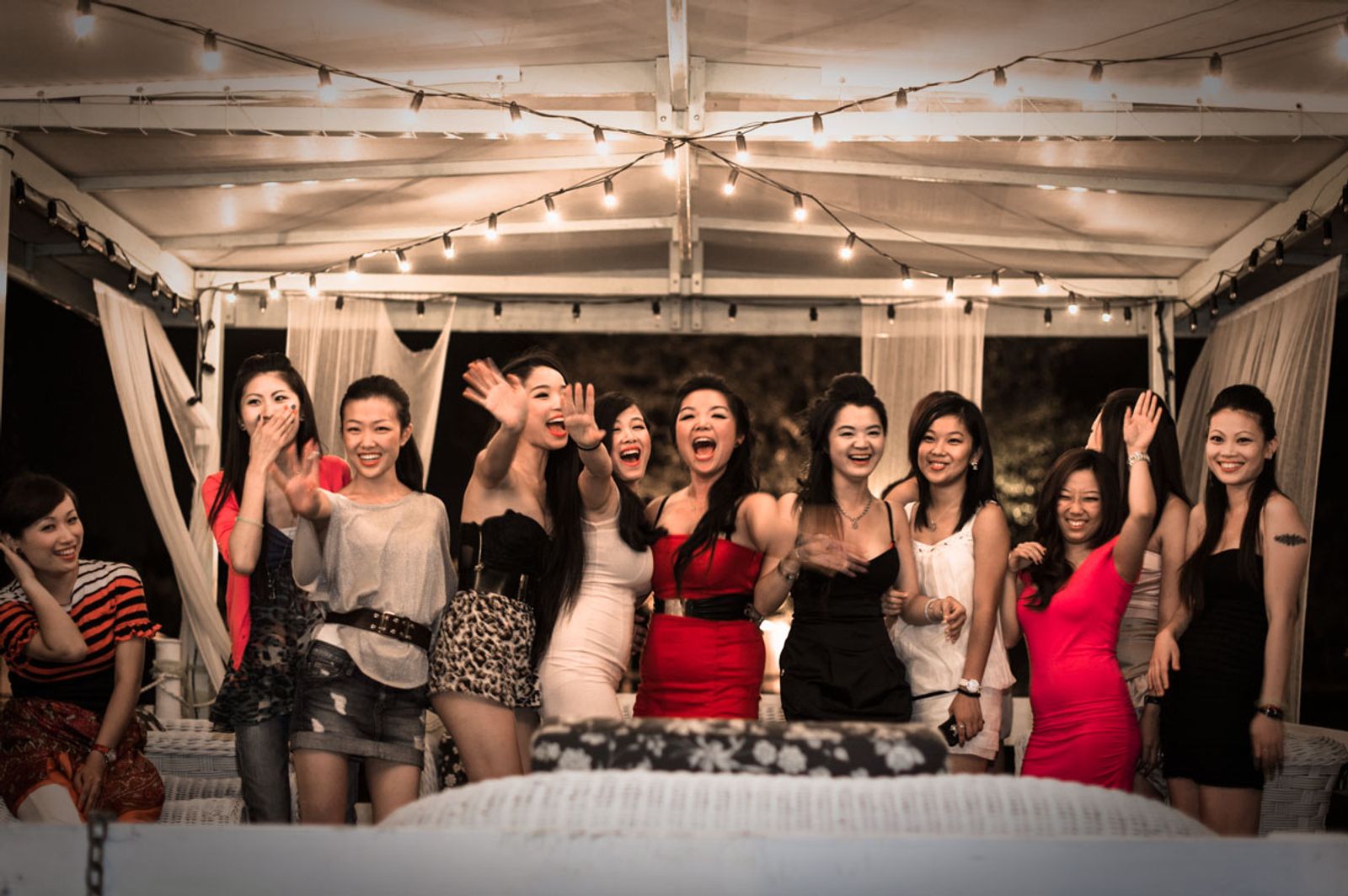 © Agnese Morganti - Prato, A group of girls pose for a photo during a summer party