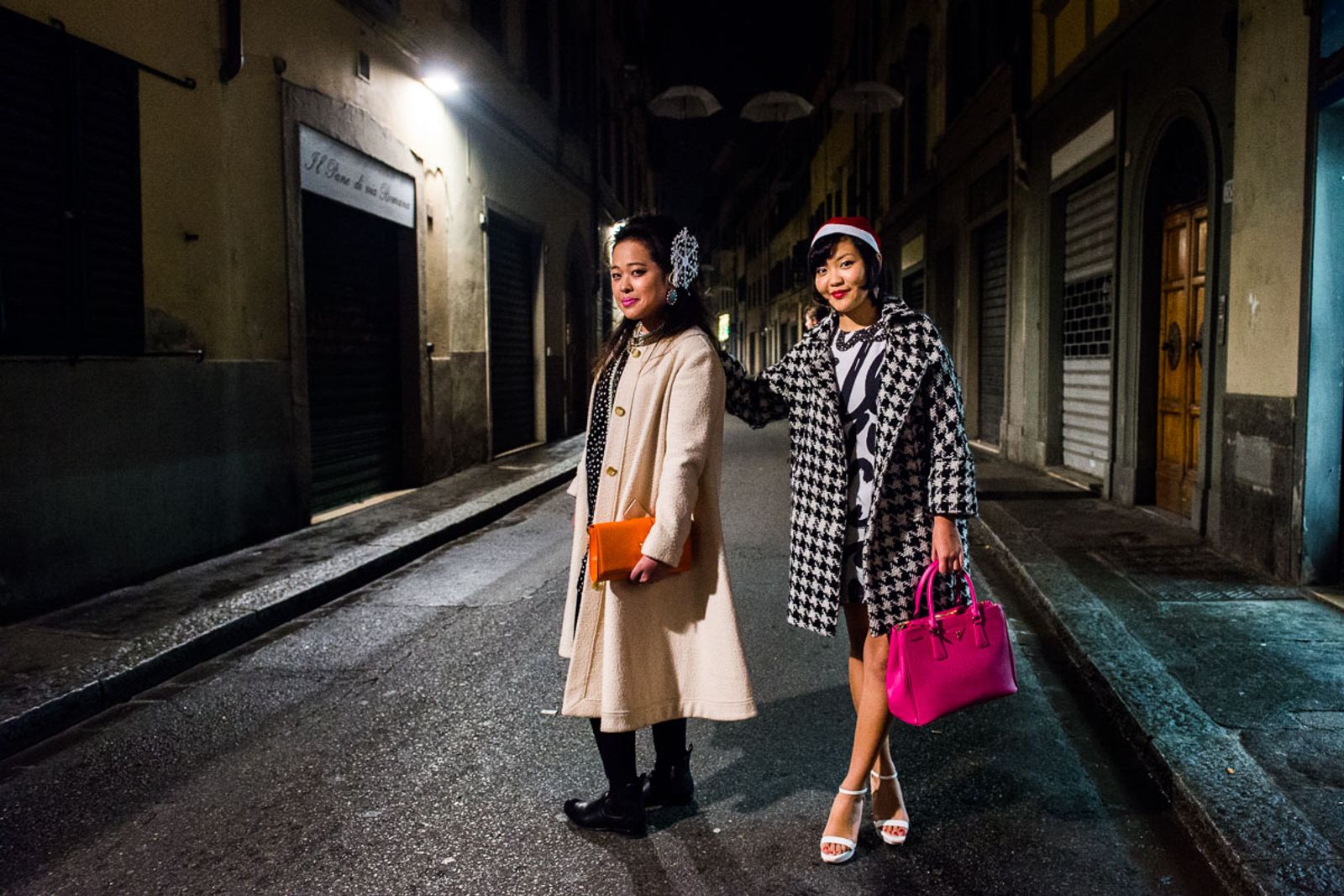 © Agnese Morganti - Florence, Cristina and Jessica, both fashion design students, pose for a photo in the San Frediano neighbourhood of Florence