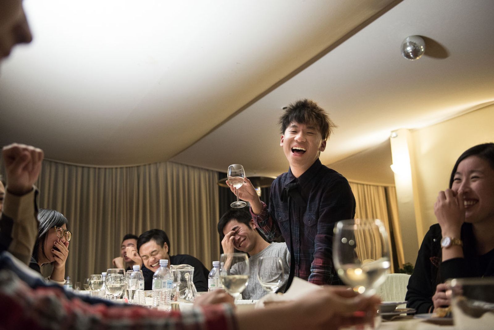 © Agnese Morganti - Florence, A group of friends enjoying dinner together