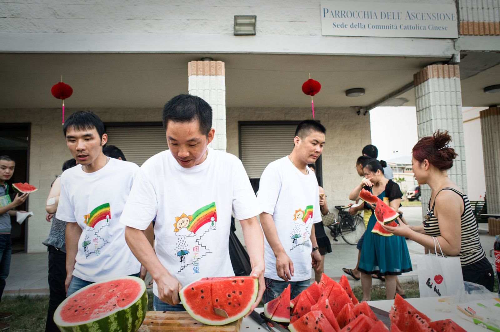 © Agnese Morganti - Prato, Members of the Chinese Roman Catholic community gather for a party at the local church.