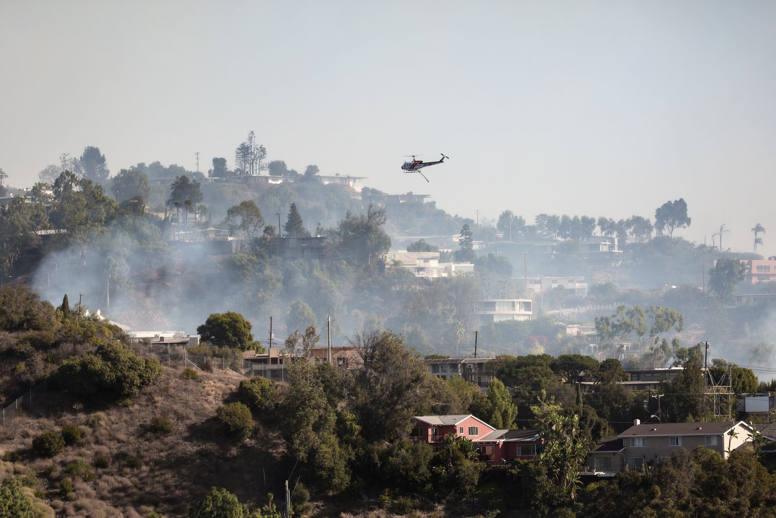 © Anastasia Samoylova - Firefighter helicopter putting out the Getty Fire. Los Angeles, CA