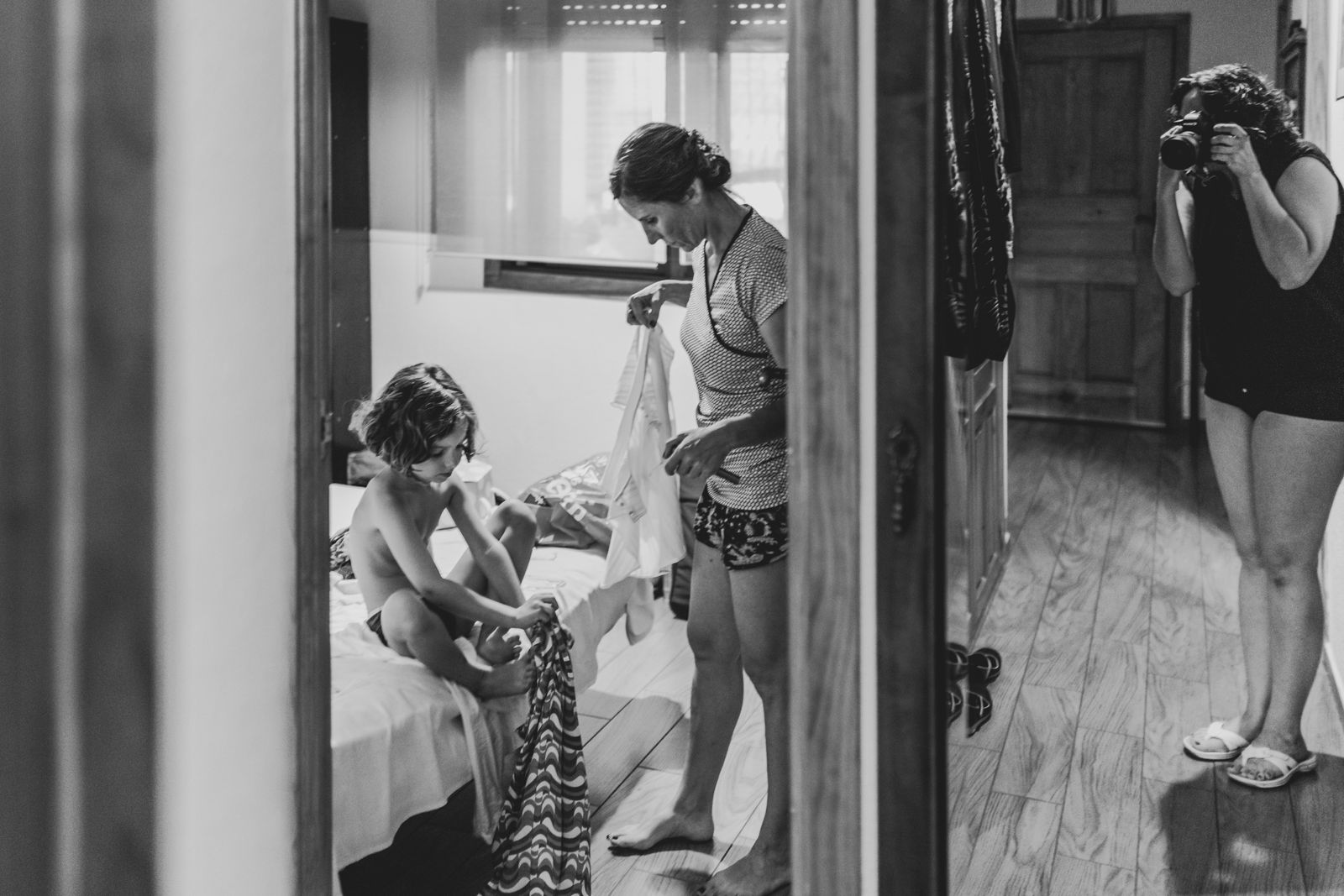 © Bego Amare - Time to get dressed, Manuela! important day for daddy and mummy