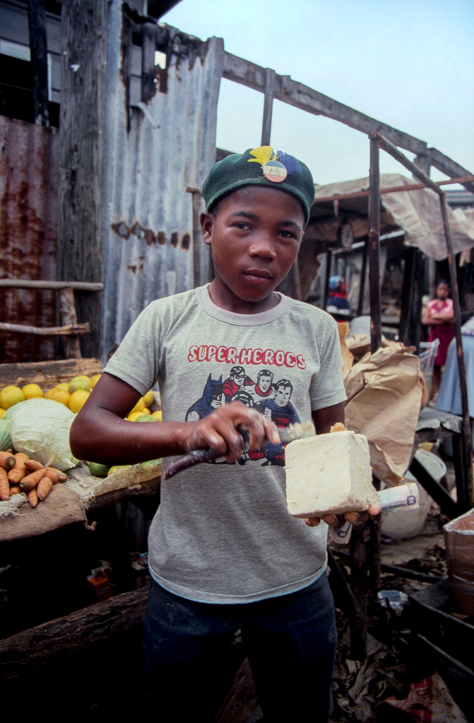 © Steven Edson - Boy selling cheese in the local open air-food market. Savanna le Mar, Jamaica