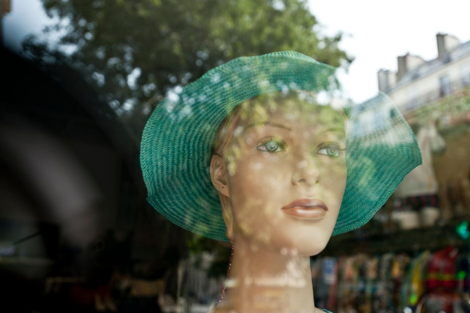 © Steven Edson - Store mannequins in window in Paris, France