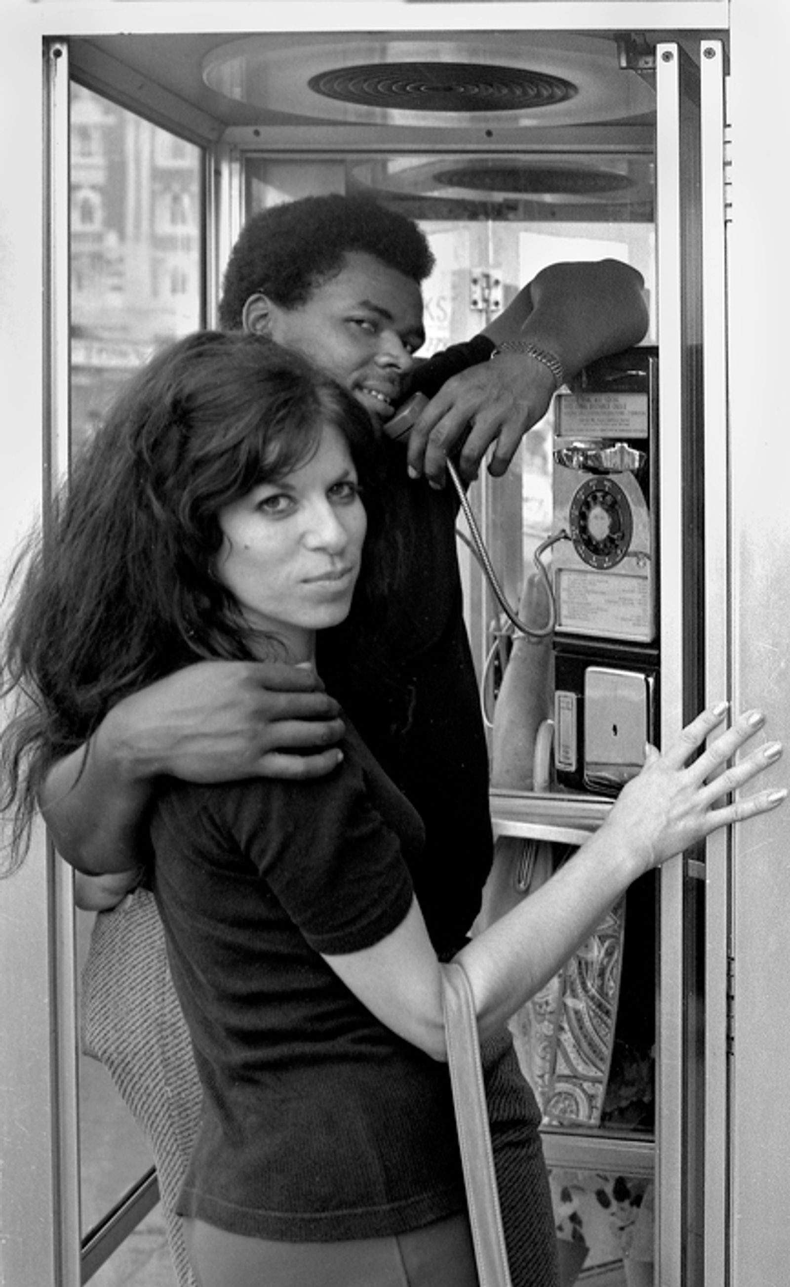© Steven Edson - Couple in telephone booth. NYC, NY