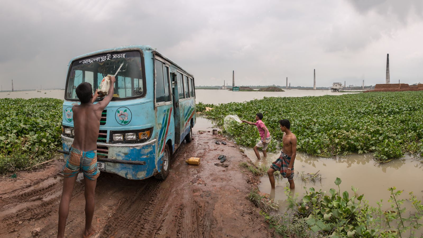 © Carrie and Eric Tomberlin - Road Closed by Rising Waters, Ashulia
