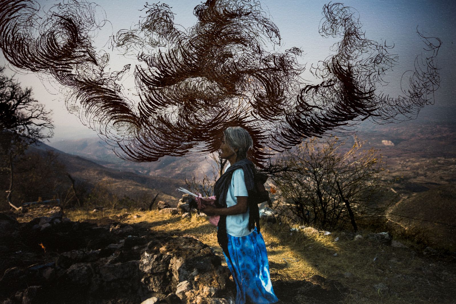 © Yael Martínez - Rain petition on the Cruzco Hill.Intervened photography.