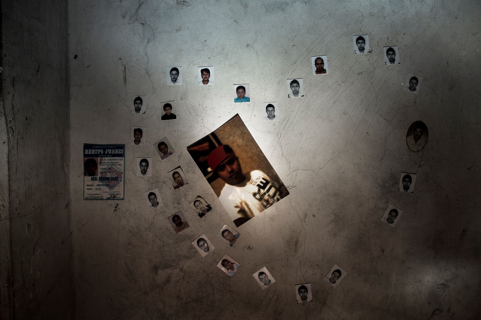 © Yael Martínez - Family heart photos on the wall of Perla Granda's bedroom of her missing