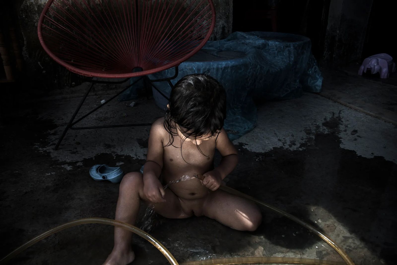 © Yael Martínez - The bather. Itzel Martinez (my daughter) taking a bath at home. Guerrero Mexico