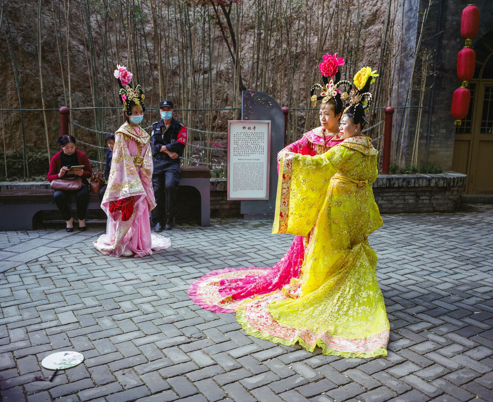 © Pan Wang - Three women in Tang Dynasty costumes are in qujiangchi ruins park