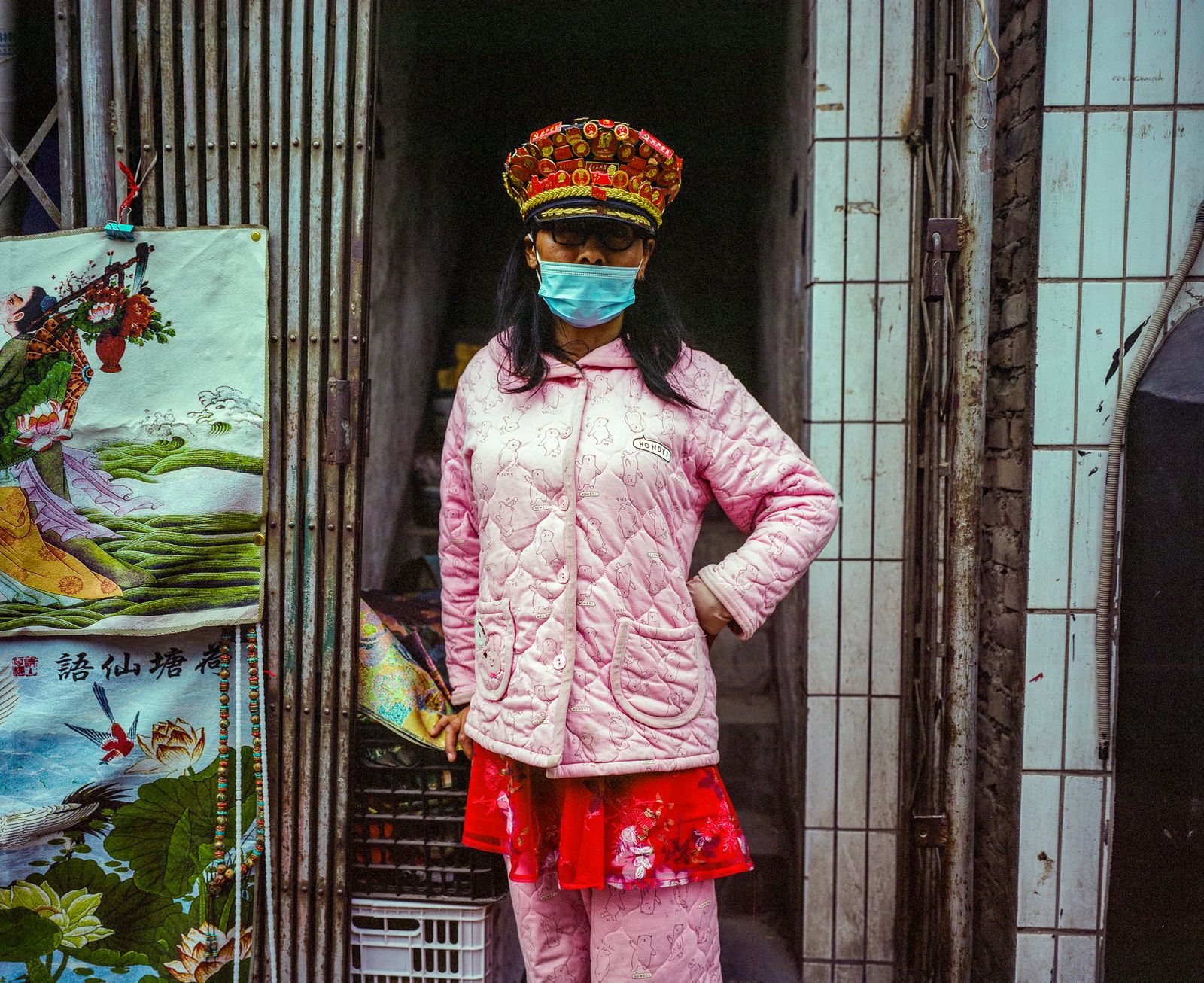 © Pan Wang - A man in a woman's dress stood in the Xicang market