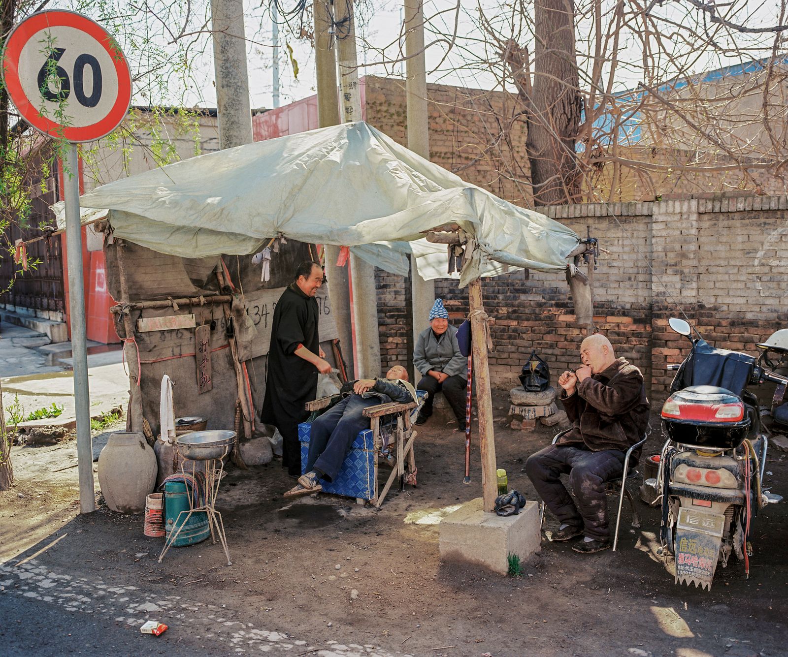 © Pan Wang - 08.Barbershop on the side of the road