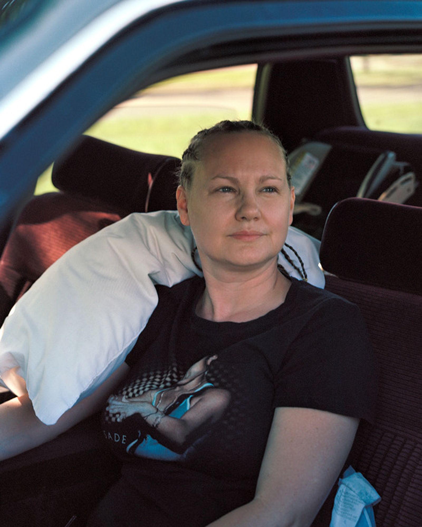 © Juan Madrid - Renee enjoys taking a nap in her car at one of the local parks on warm days.