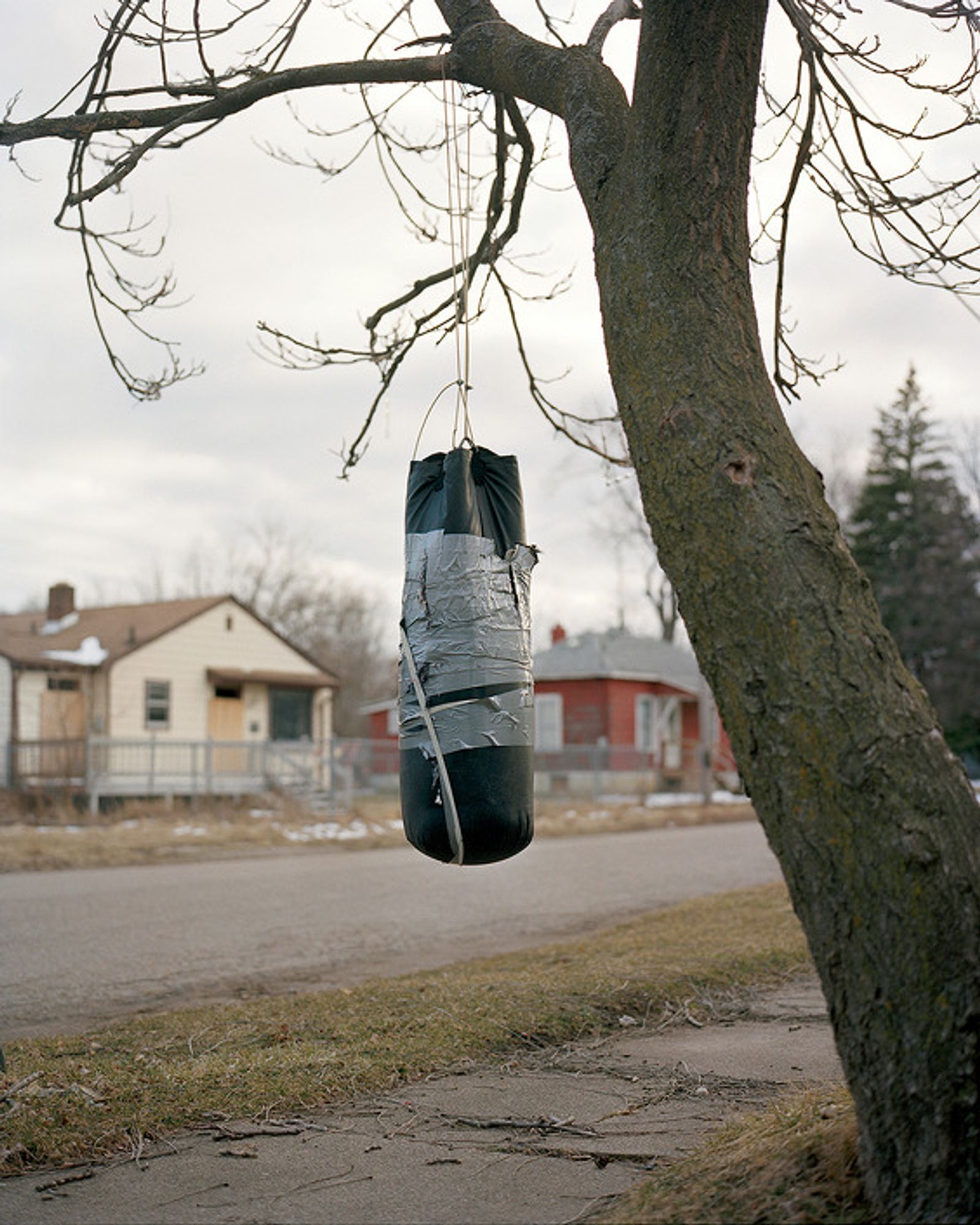 © Juan Madrid - A punching bag on the East Side. The owner was incarcerated for domestic abuse at the time of the photograph.