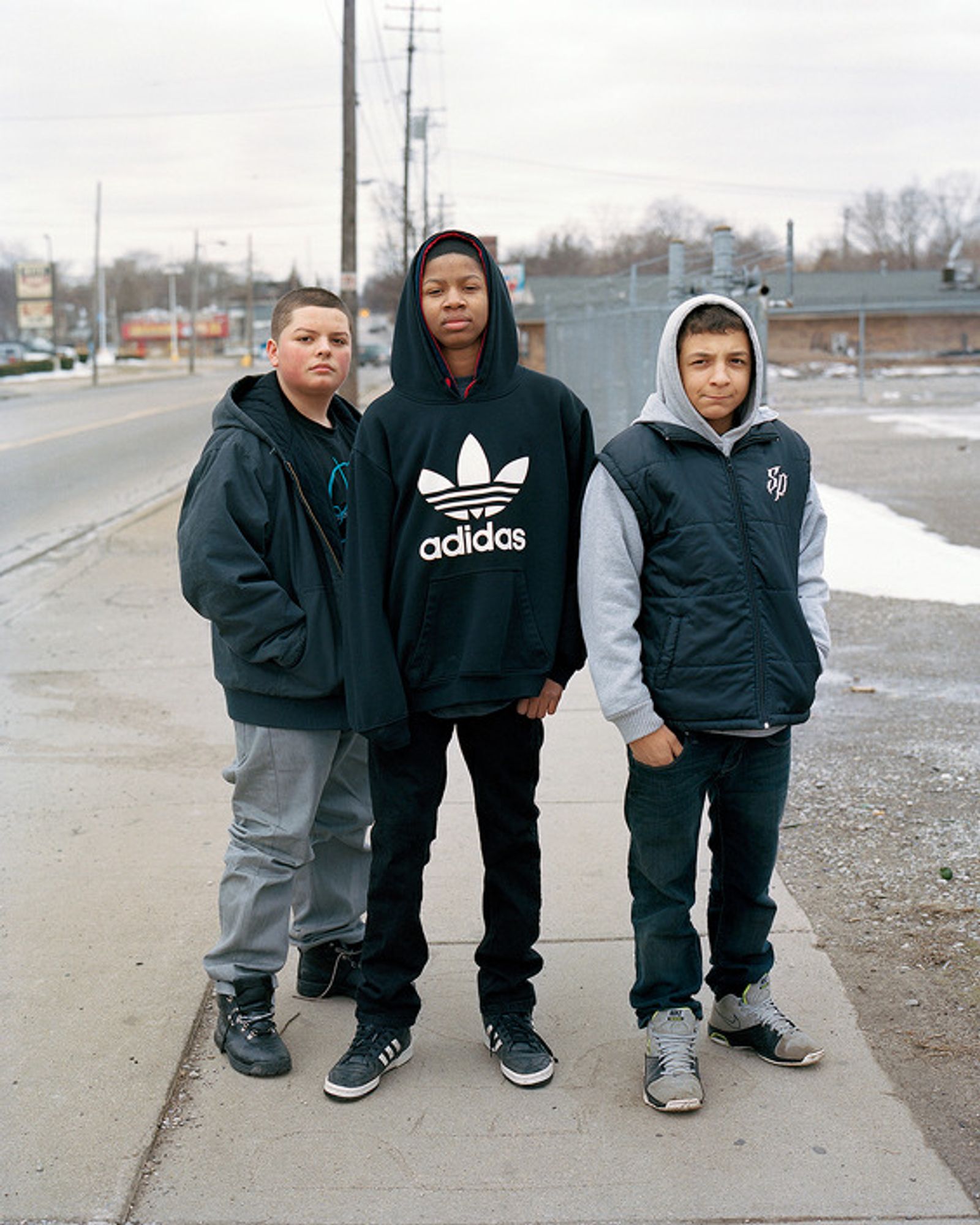 © Juan Madrid - Three young men on the East Side.