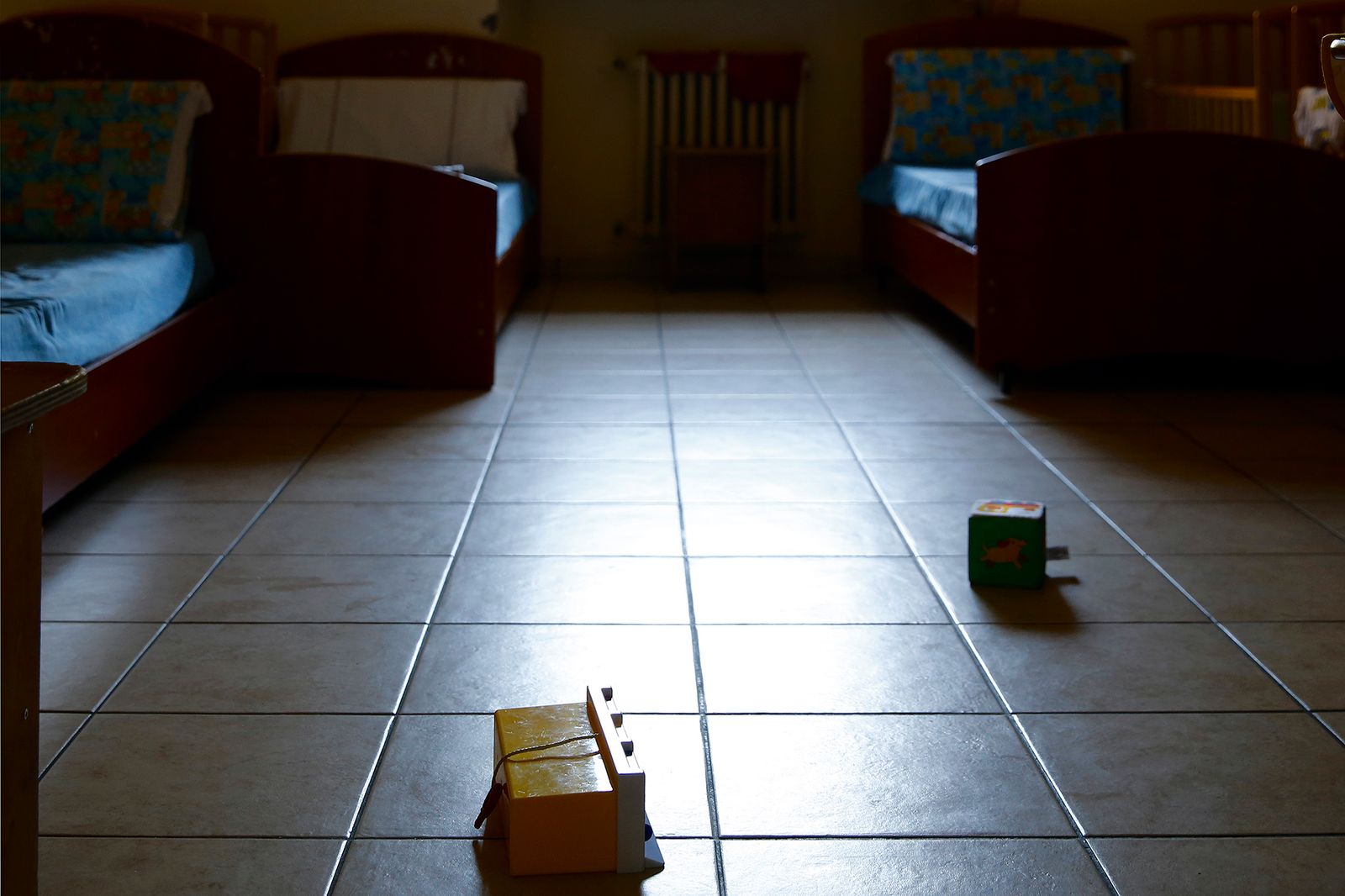 © Francesca Pompei - Toys on the floor  in a cell of the kindergarten area of the women's section of Rome's Rebibbia prison.