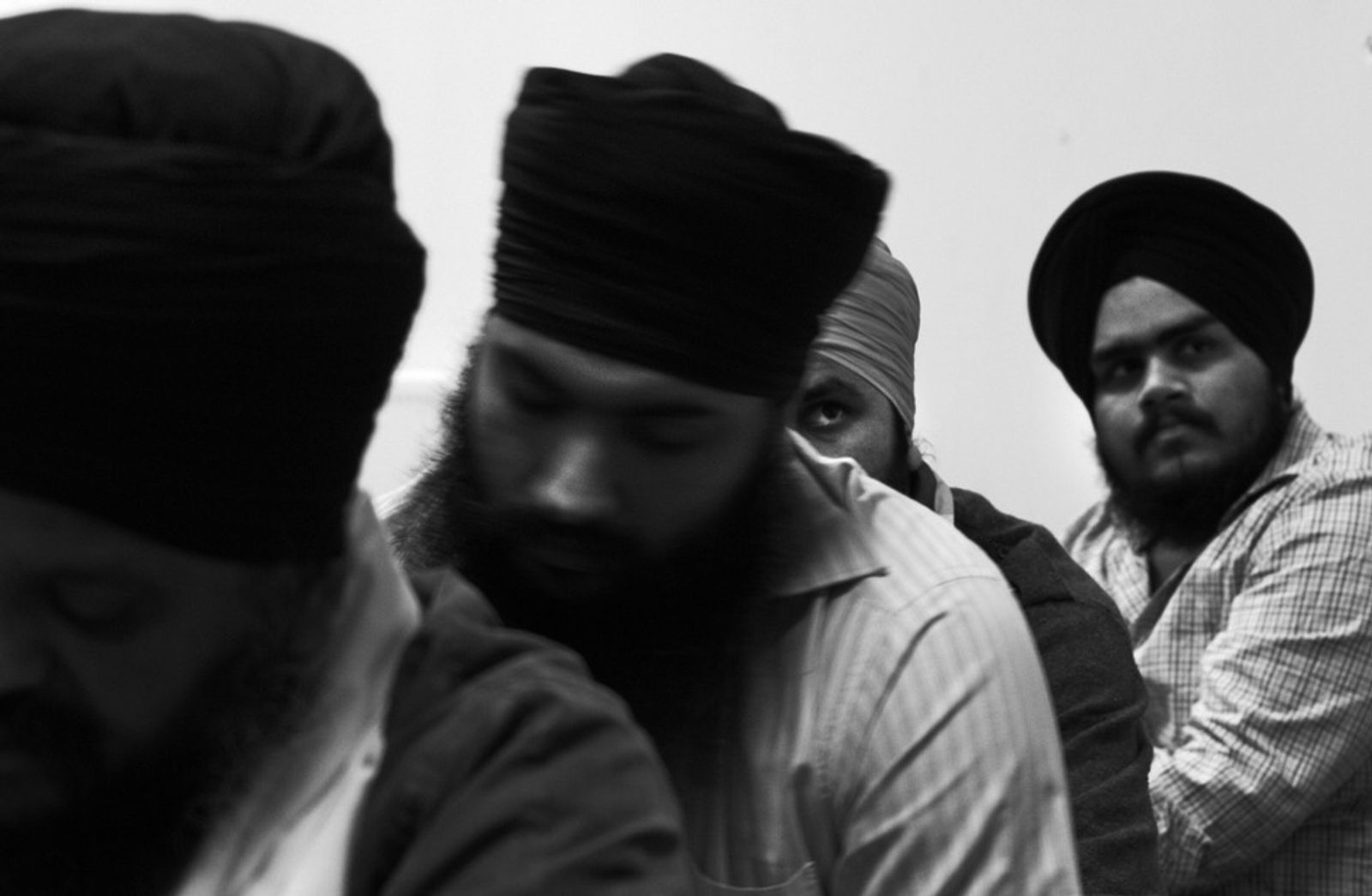 © Stephen Boyle - Sikh men at prayer in the Gurdwara Guru Nanak Darbar, the principle Sikh temple in Dublin.BallsbridgeSeptember, 2011