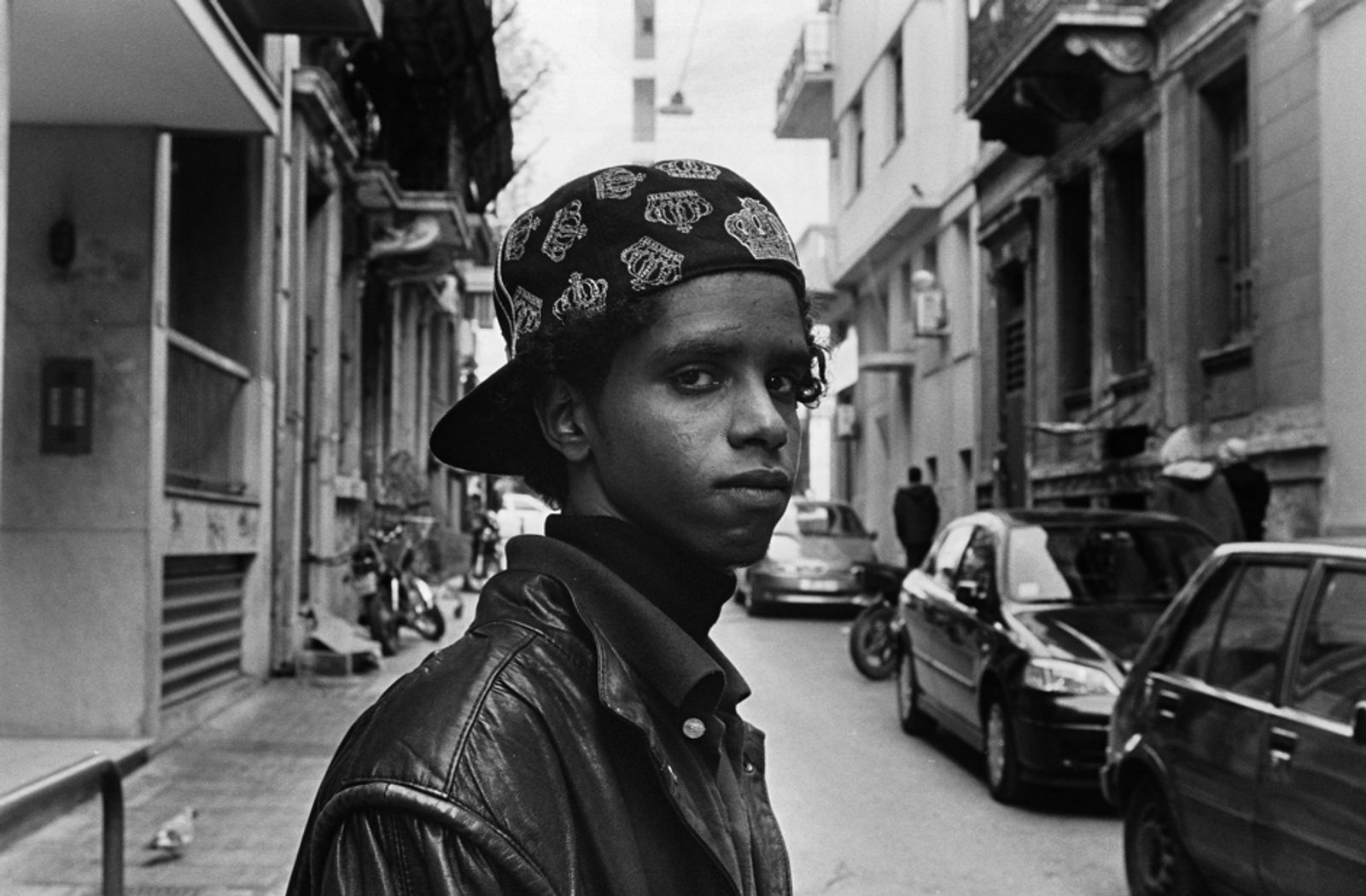 © Stephen Boyle - Somali migrant boy in the street in central Athens. 2011