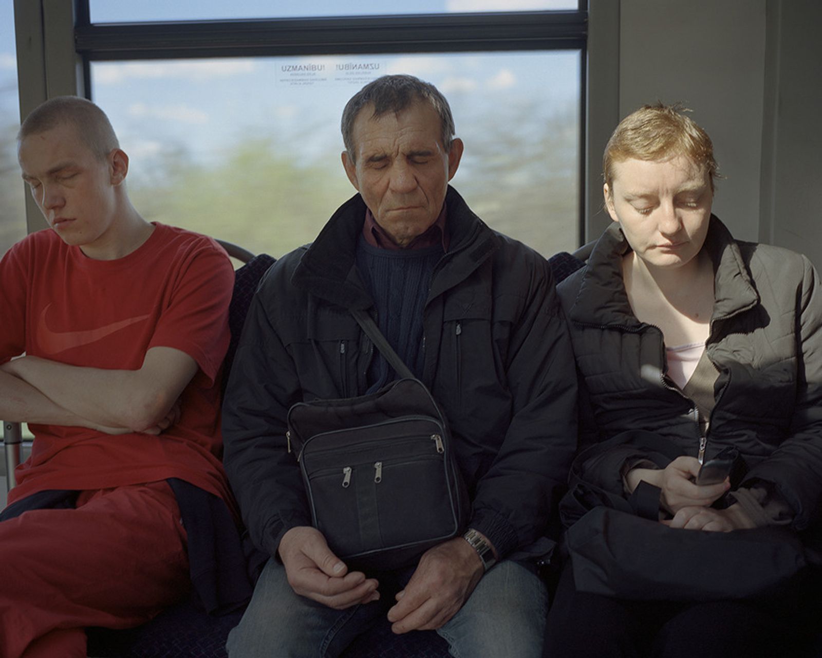 © Andrejs Strokins - Passengers in Pļavnieki - Bolderaja bus, 2012