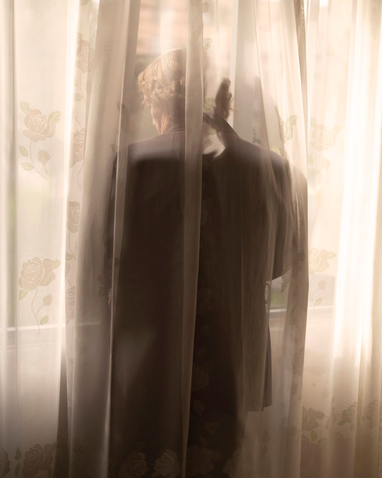 © Margarita V Beltran - Mom behind a house veil.