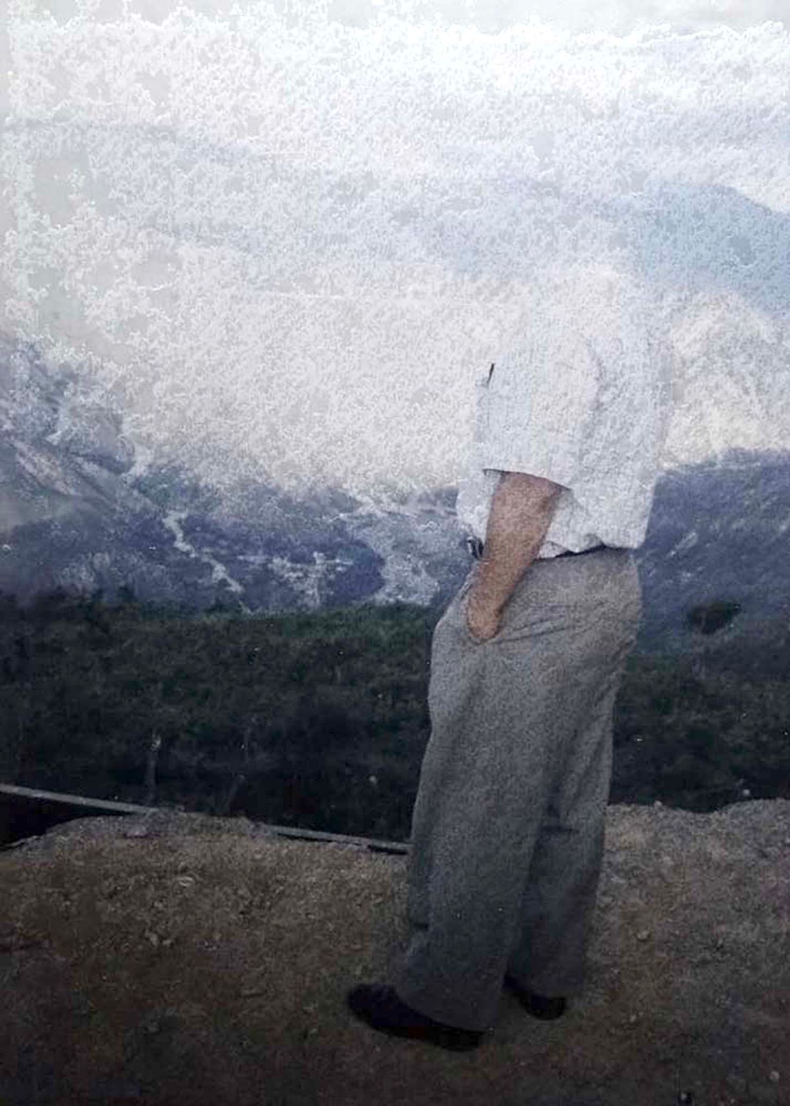 © Margarita V Beltran - Intervened archive image of my father in the mountains sourrounding the town where he was major.