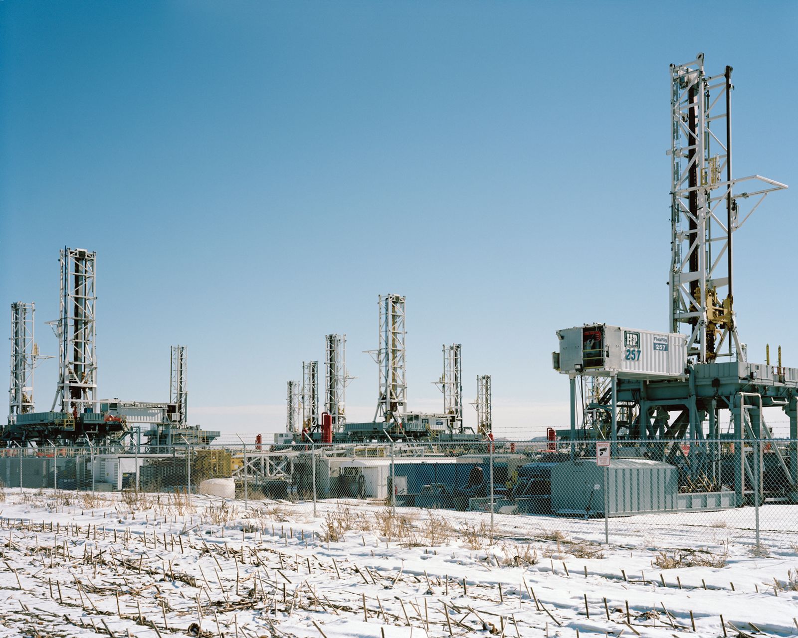 © Sarah Christianson - Drilling rigs at Five Diamond Industrial Park, Dickinson, February 2016.